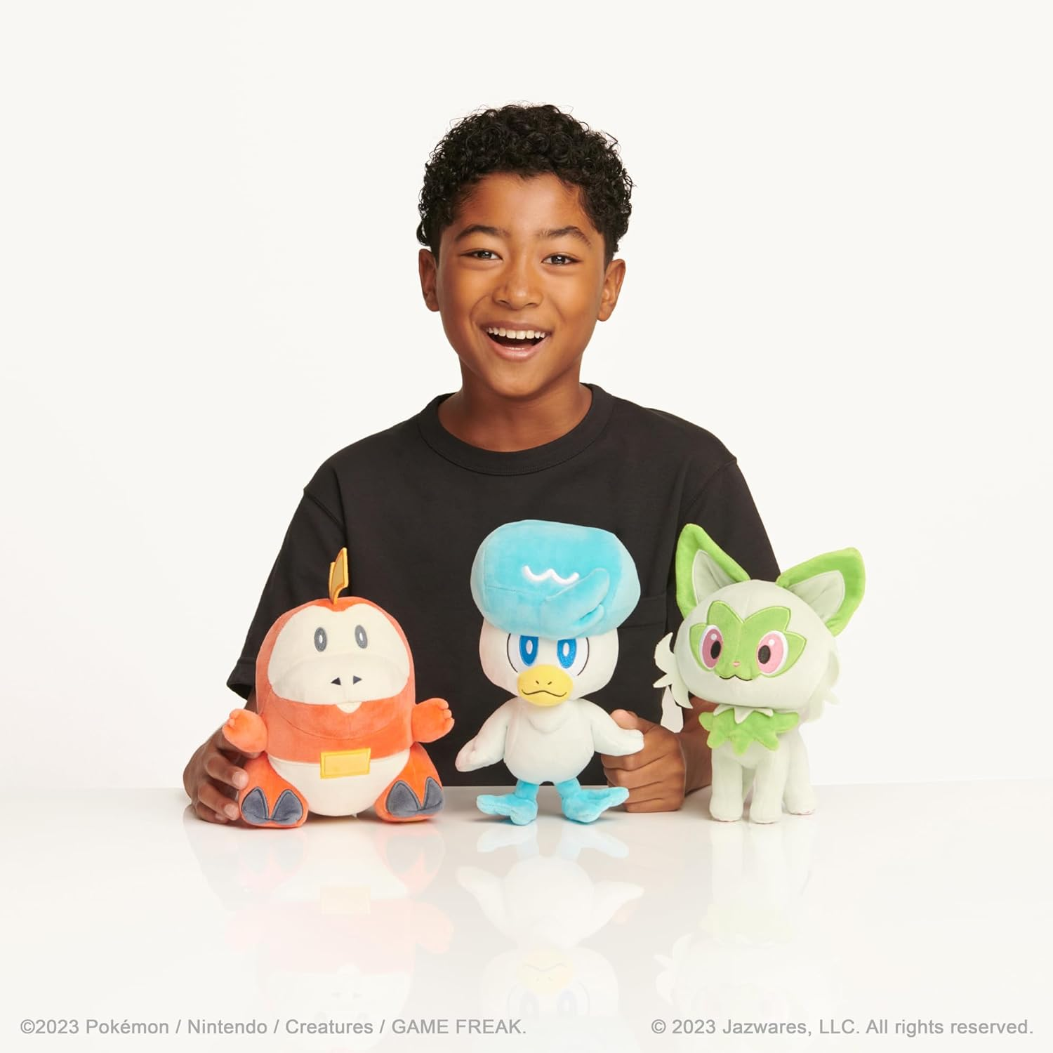 Pok&eacute;mon Paldea First Partner Plush 3 Pack - 8-Inch Plush of Fuecoco, Quaxly, and Sprigatito image number 4