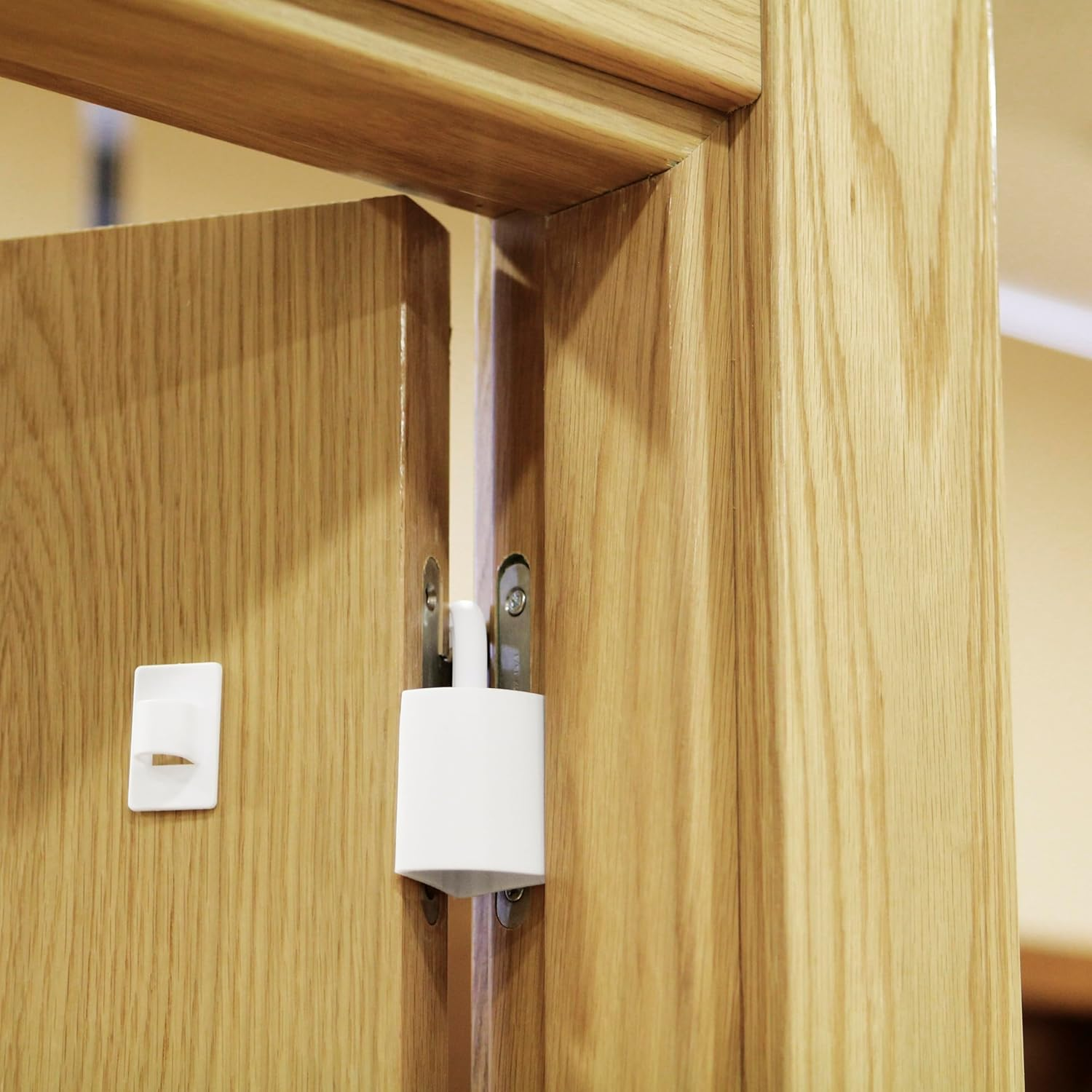 Amig - Pack of 2 Door Stoppers for Hanging Hinges, Blocks the Door and Prevents Unwanted Locks, Includes Adhesive Holder for Hanging When Not in Use, White image number 5