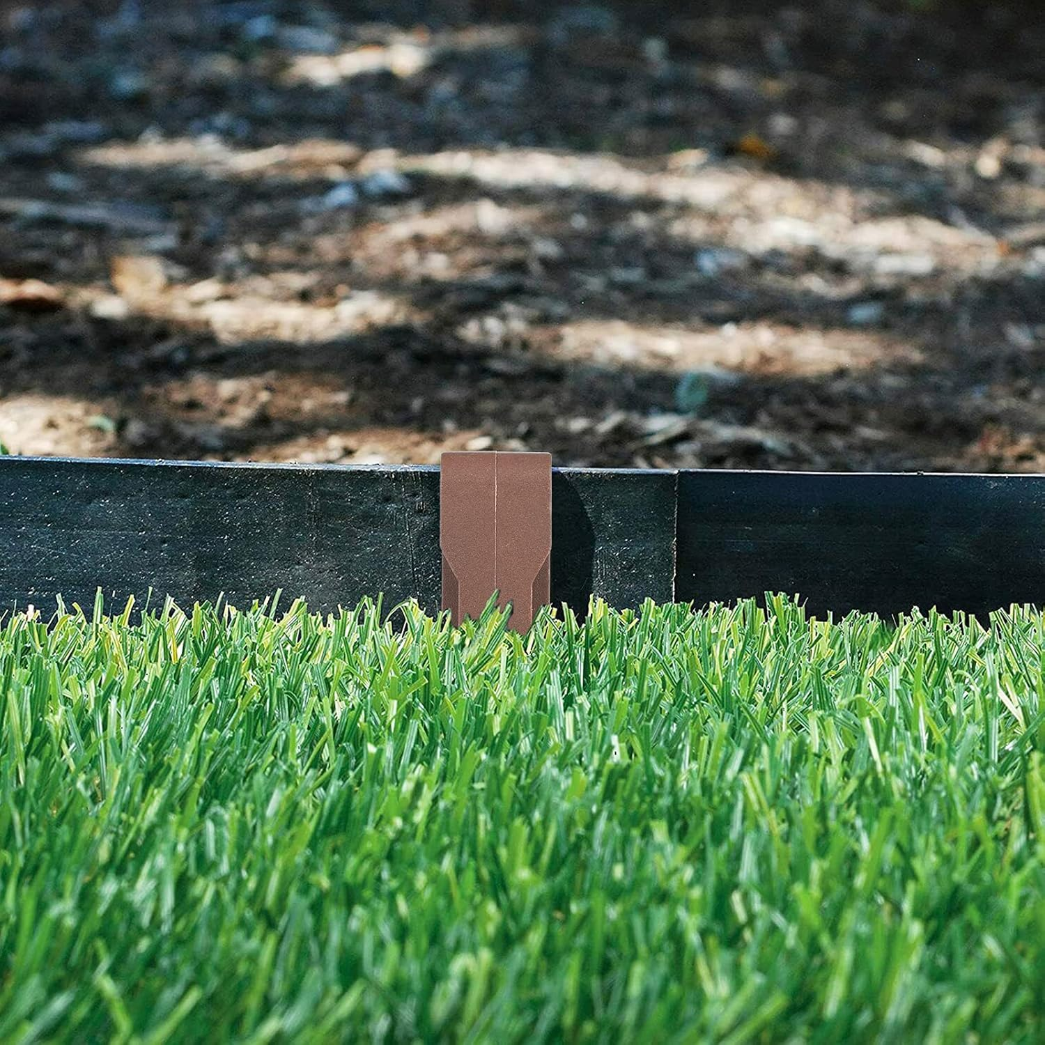 KINGLAKE Garden Landscape Edging Stakes 9.7 Inch 12 Pack Heavy Duty Plastic Garden Netting Ground Stakes,Anchoring Spikes for Edging & Terrace Board (Brown) image number 1