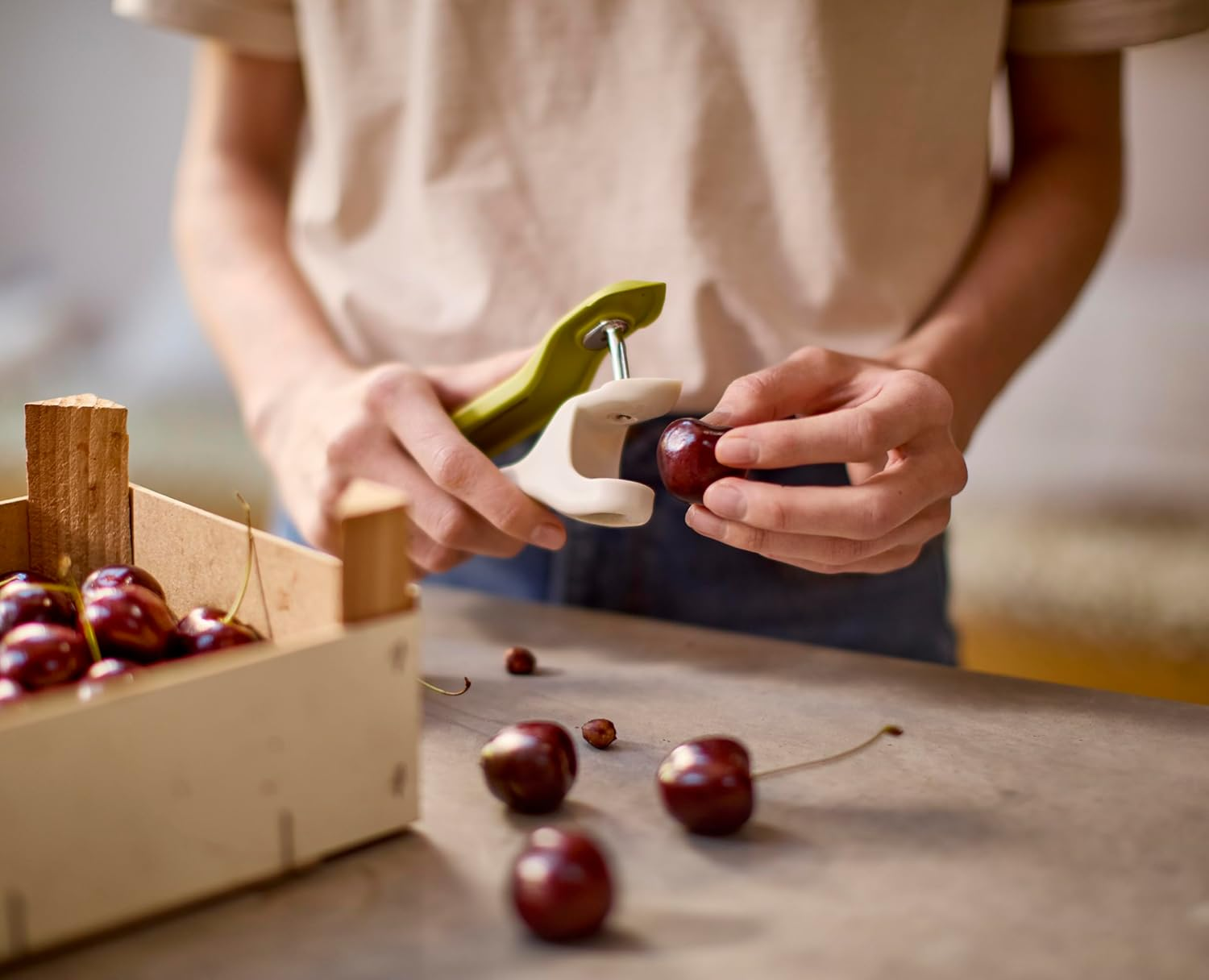 Joseph Joseph Tweezy 2-In-1 Cherry Olive Pitter and Strawberry Huller, Space Saving Storage, BPA Free image number 3