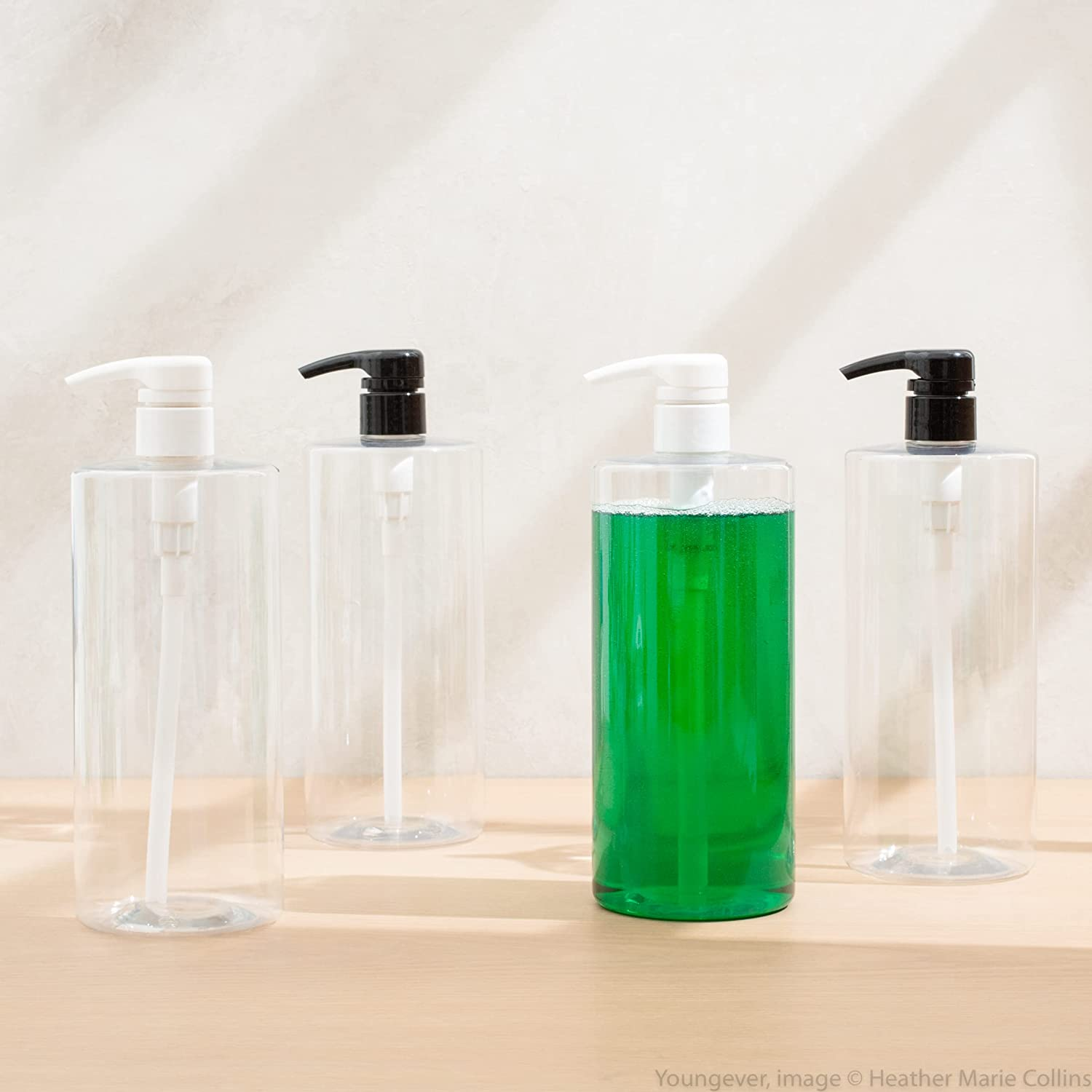 Youngever 4 Pack 1000ML Plastic Pump Bottles for Shampoo, 1 Liter Empty Shampoo Pump Bottles, Plastic Cylinder with Lockdown-Leak Proof-Pumps (White Pump)