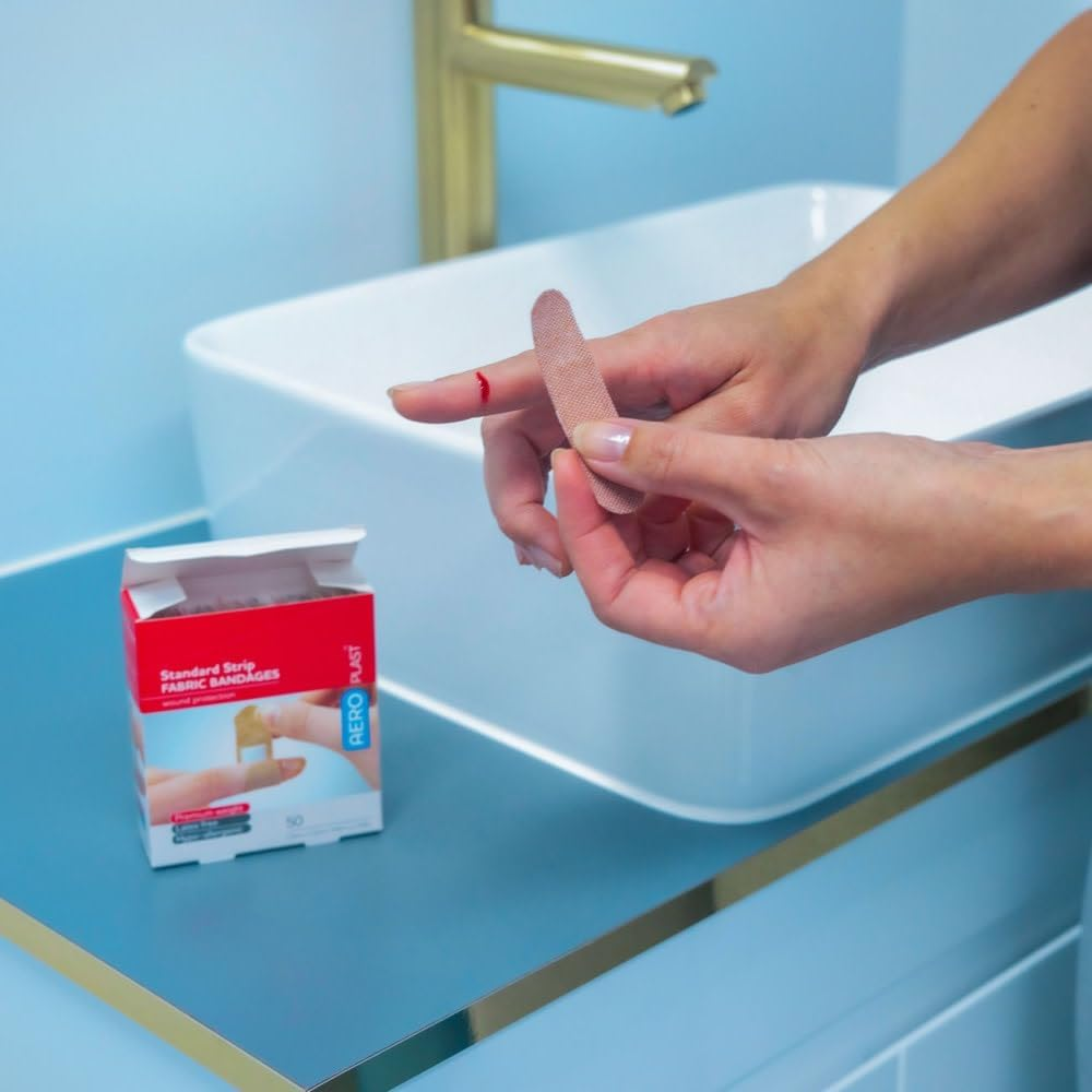 AEROPLAST Premium Fabric Standard Strip Plasters with Strong Adhesion, Breathable Hypo‑Allergenic Latex‑Free Dressing for Sensitive Skin, Conforming Flexible Protection, 1.9 Cm X 7.2 Cm, Box of 50 image number 2