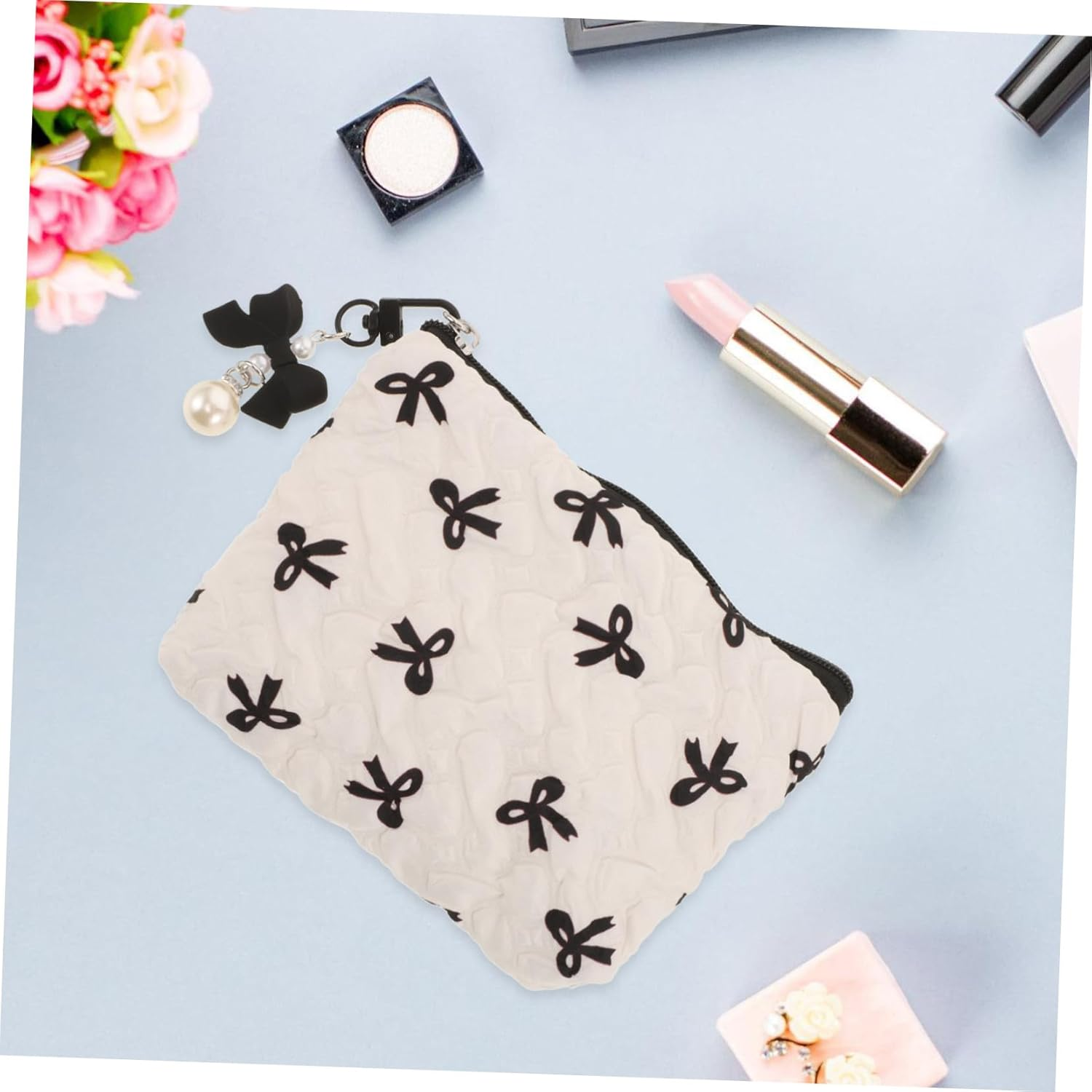 FINISPERSOO Embossed Bow Small Makeup Bag with Wrinkle Design, Portable Cosmetic Organizer Pouch for Women, Cute Toiletries Holder for Travel and Daily Use, Black Bow Detail