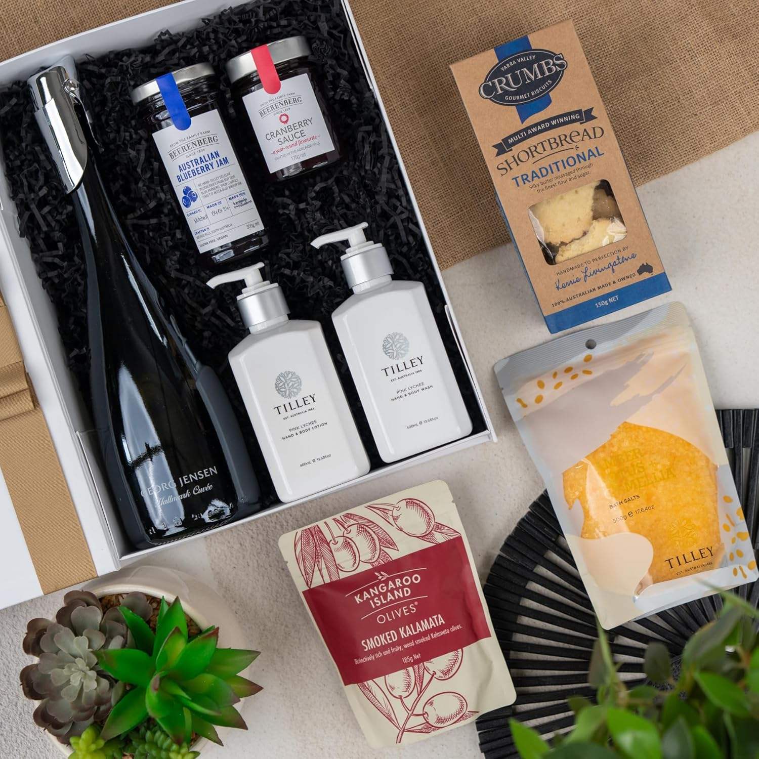 Georg Jensen Cuvee Celebration Hamper | Ultimate Gift Set: Georg Jensen Cuv&eacute;e, Blueberry Jam, Cranberry Sauce, Shortbread, Smoked Olives, Bath Salts, Lychee Body Wash & Lotion image number 1