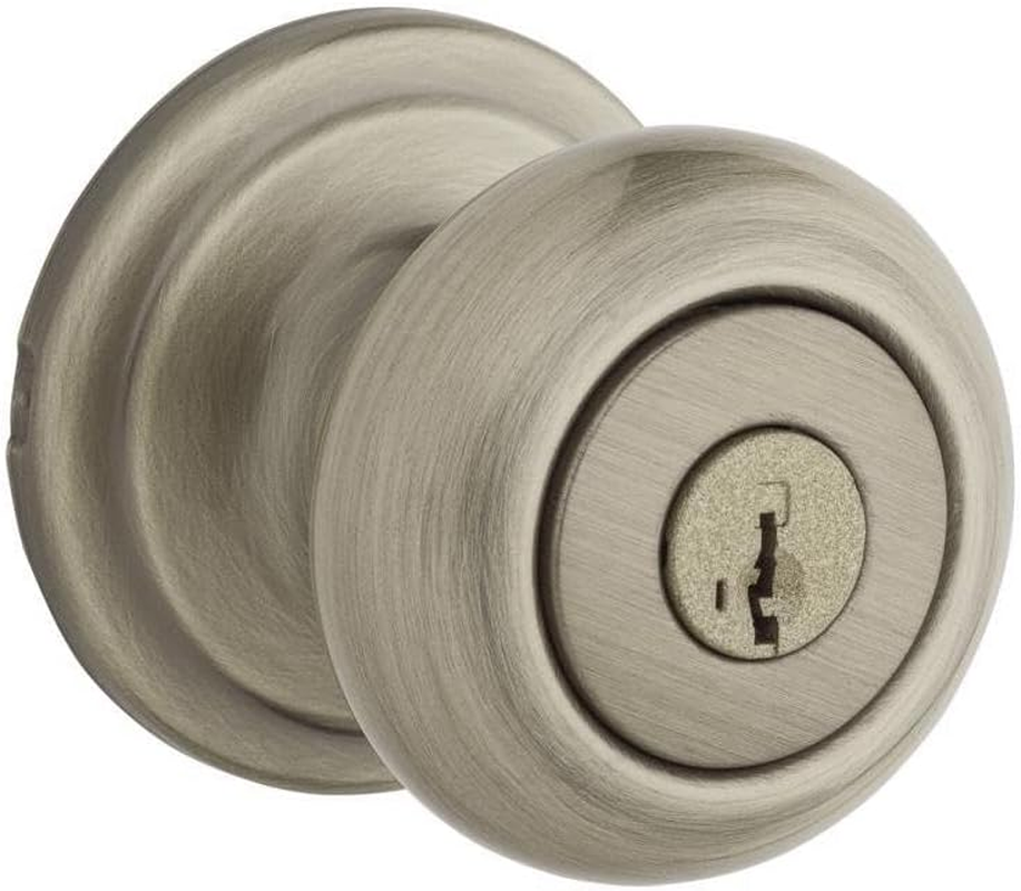 Kwikset Juno Entry Knob Featuring Smartkey in Antique Brass