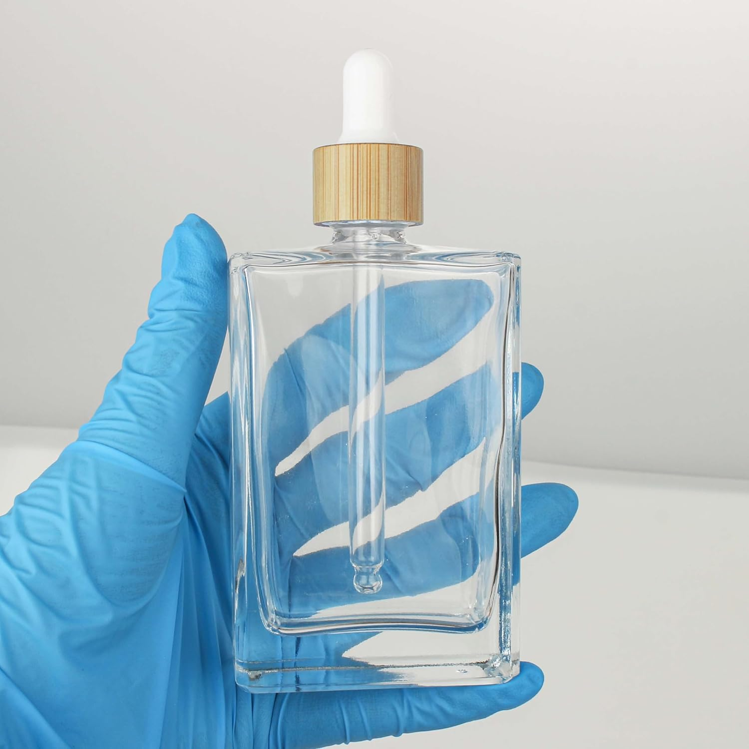 COSIDEA 3 Pcs Empty 3.33Oz / 100Ml Empty Clear Flat Glass Dropper Bottles Droppers for Oils Bamboo Cap Essential Oil Bottle Travel Serum Containers image number 1