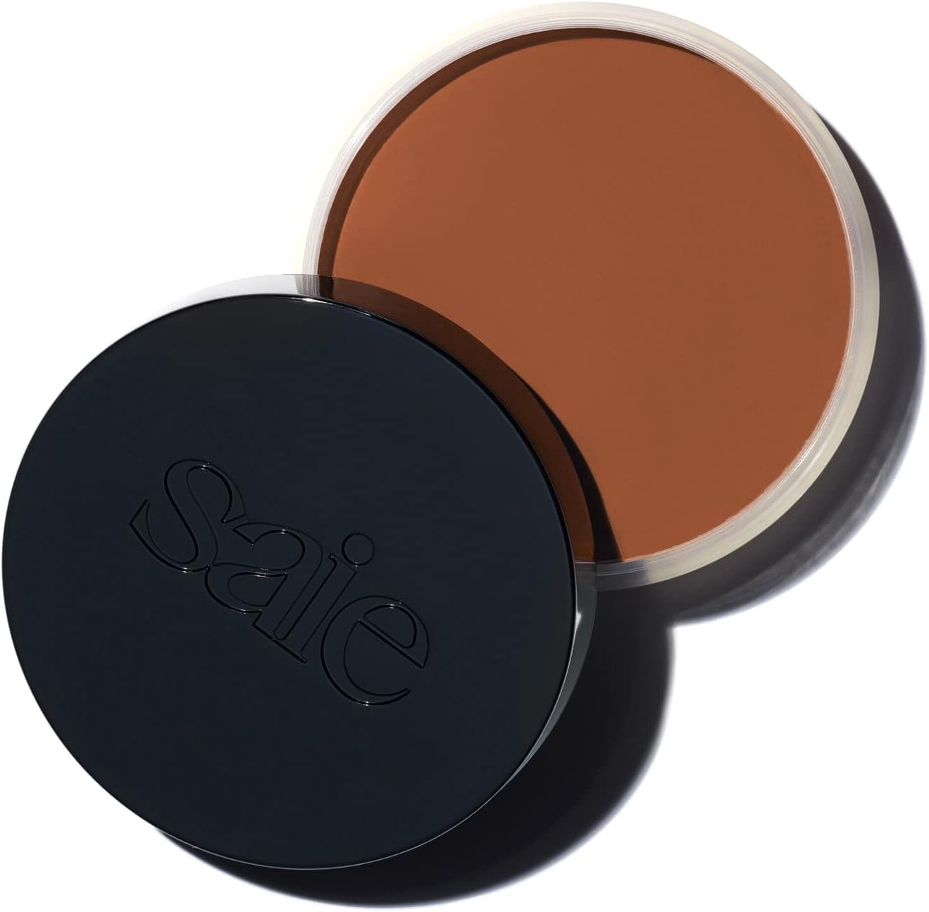 Saie Sun Melt Cream Bronzer - Buildable Balm Face Bronzer for Effortless Sculpting - Cream Contour Enriched with Vitamin C, Nourishing Skincare Ingredients & a Natural Finish - Tan Bronze (1 Oz)