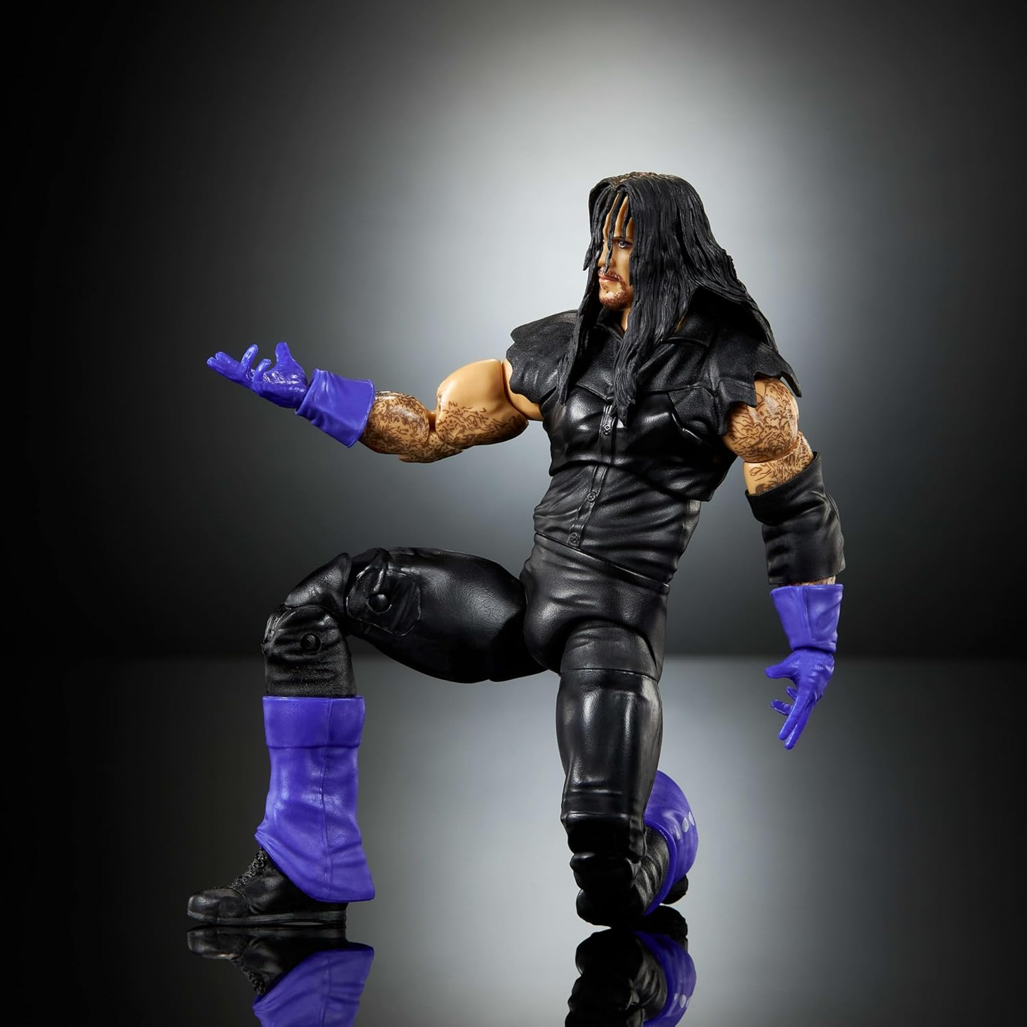 Mattel WWE Legends Ultimate Edition Action Figure & Accessories Set, Undertaker 6-Inch Collectible with Swappable Heads & Hands image number 1