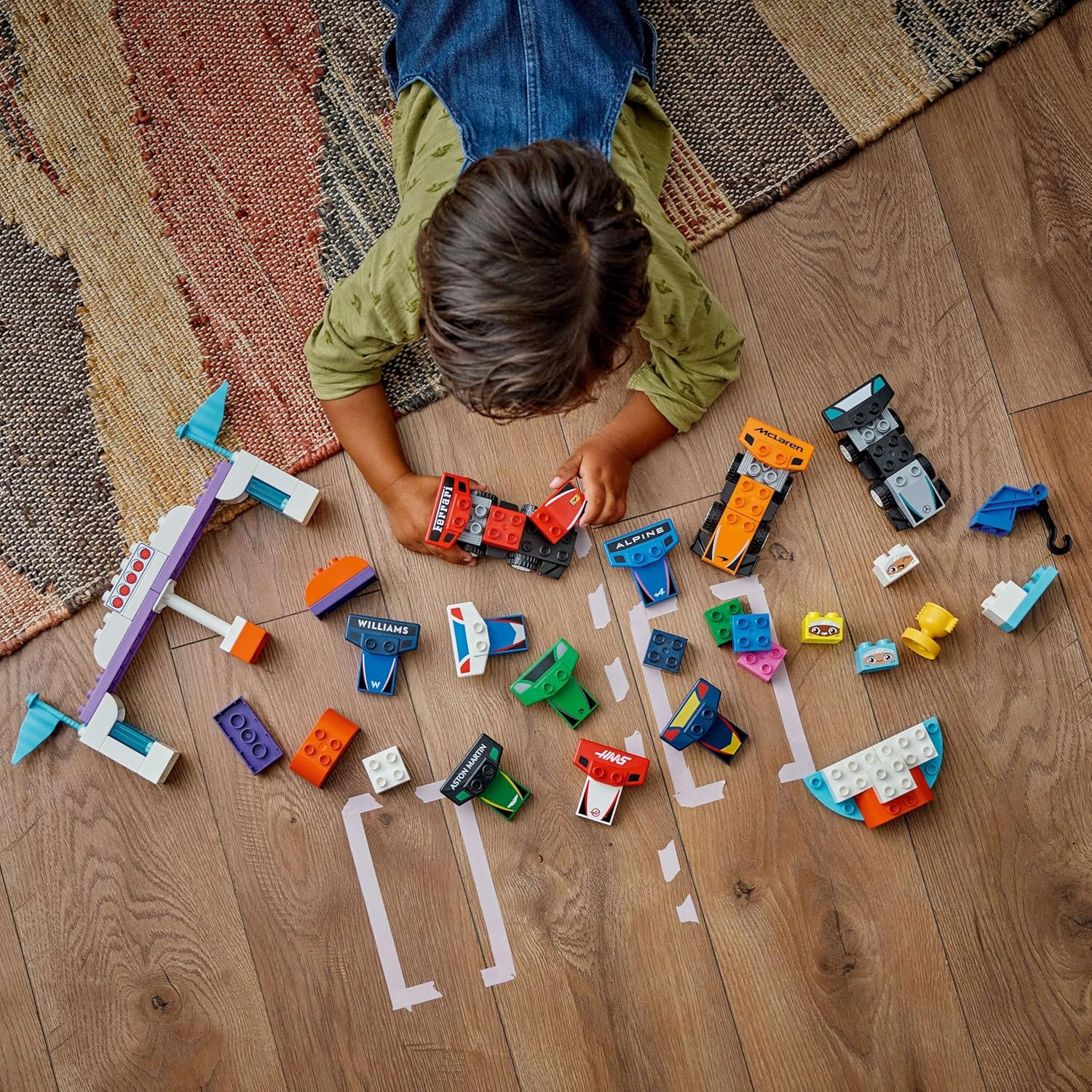 LEGO DUPLO F1 Team Race Cars & Drivers Building Set with 10 F1 Toy Cars and a Crane, Formula One Kids Vehicle Playset for 2 plus Year Old Toddlers, Boys & Girls, Helps Build Fine Motor Skills 10445