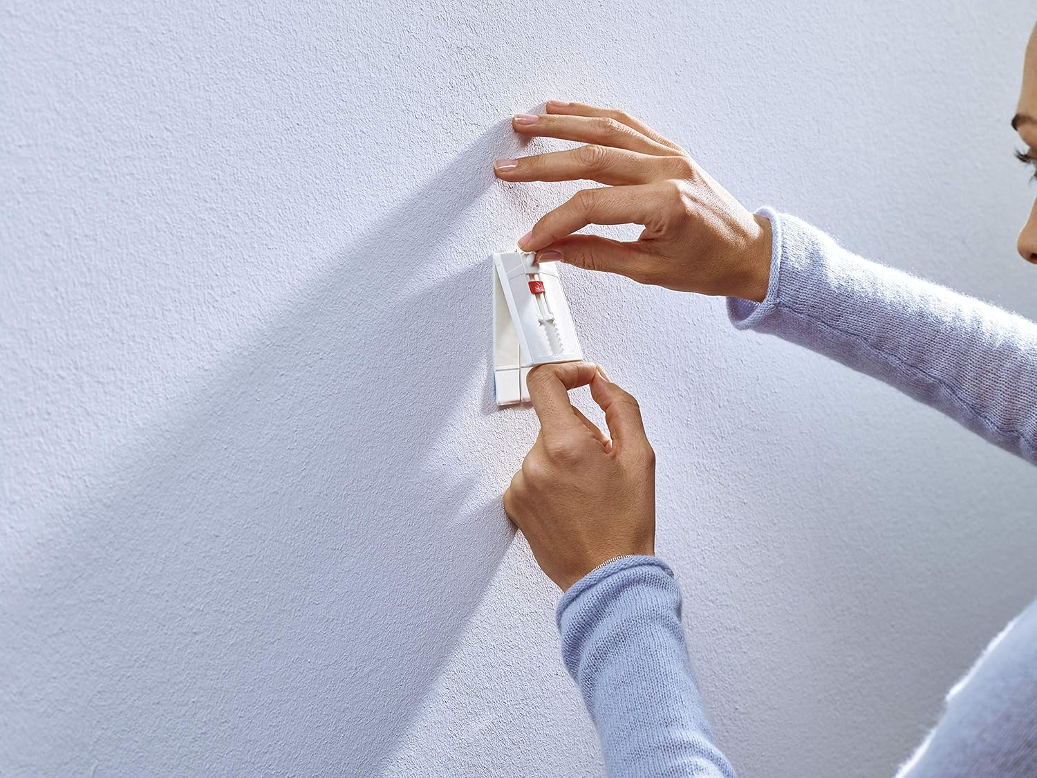 Tesa Adjustable Adhesive Nail for Wallpaper and Plaster 2 Kg in Pack of 3 - Height Adjustable, Self-Adhesive Wall Nail - up to 2 Kg Holding Capacity per Nail - 3 X 2 Adhesive Nails image number 2