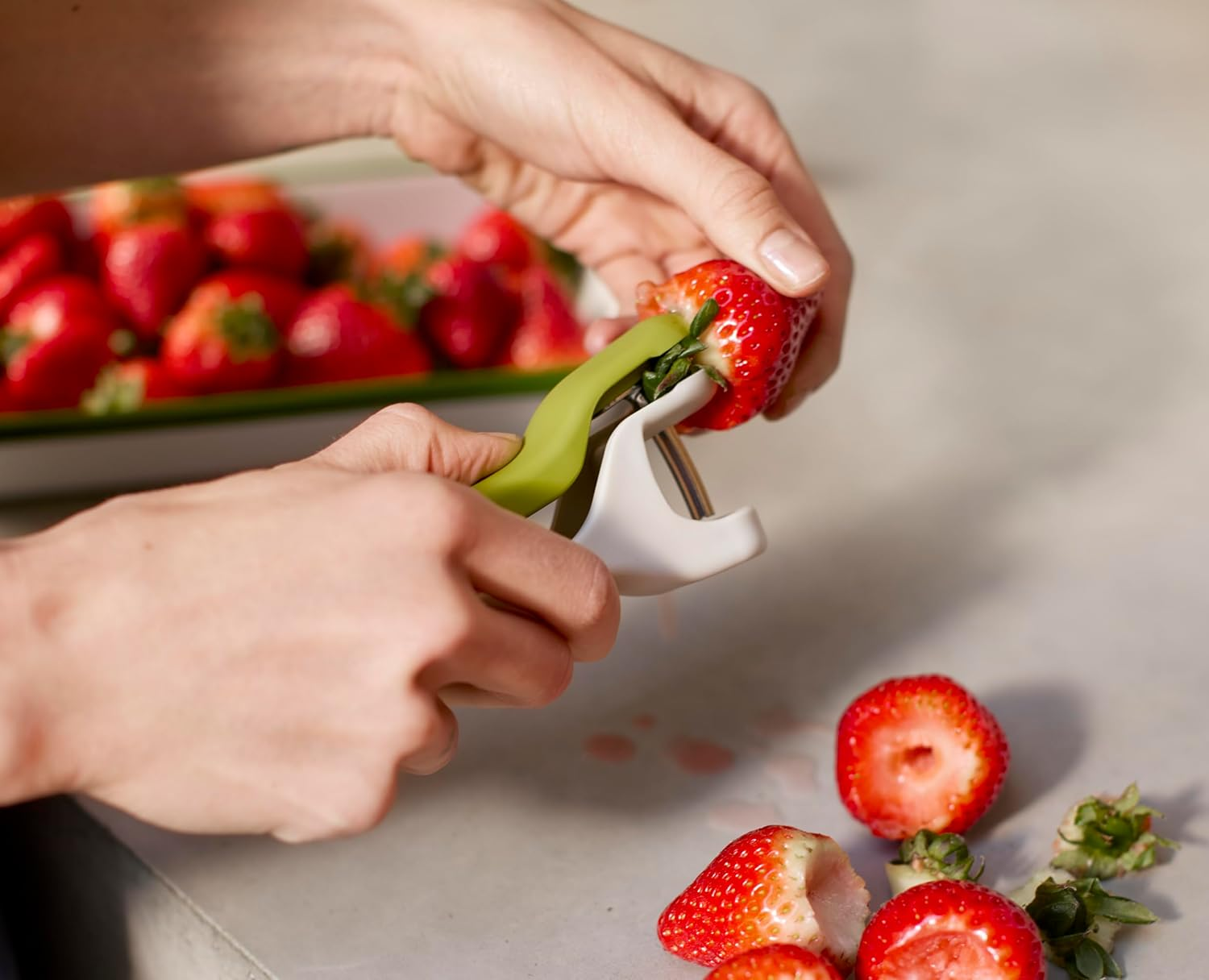 Joseph Joseph Tweezy 2-In-1 Cherry Olive Pitter and Strawberry Huller, Space Saving Storage, BPA Free image number 1