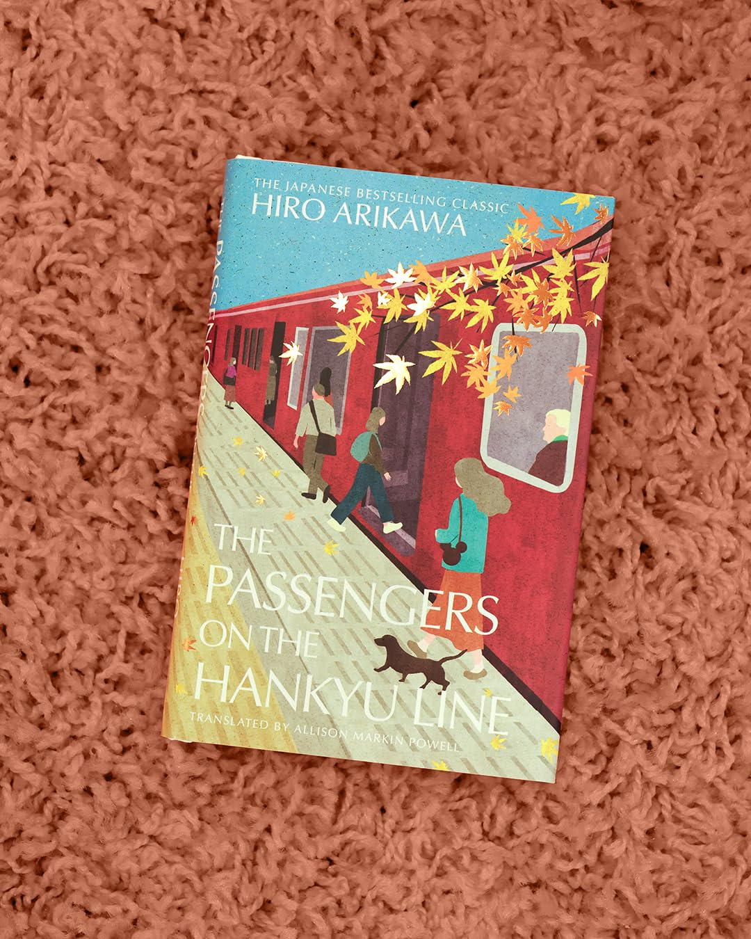 The Passengers on the Hankyu Line: the Beloved Japanese Modern Classic from the Author of the Travelling Cat Chronicles image number 1