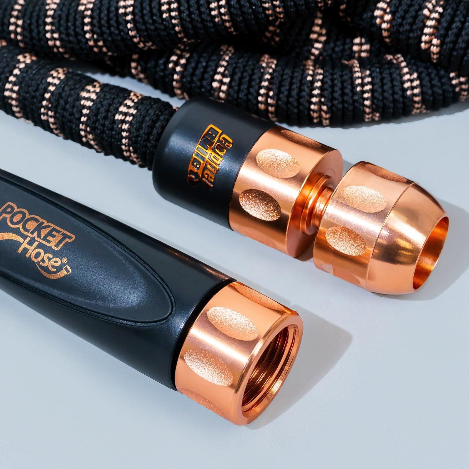 Pocket Hose Copper Bullet AS-SEEN-ON-TV Expands to 100 Ft Removable Turbo Shot Multi-Pattern Nozzle 3/4 in Solid Copper Anodized Aluminum Fittings Lead-Free Lightweight No-Kink Garden Hose image number 3