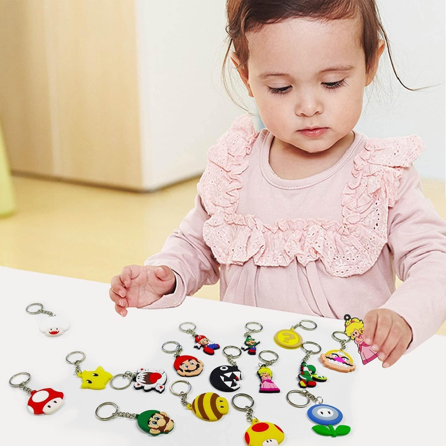 Kids Party Favors Set , 24Pcs Cartoon Keychains and 100Pcs Stickers, Birthday Party Supplies Game Prizes Gift for Kids Boys and Girls image number 1