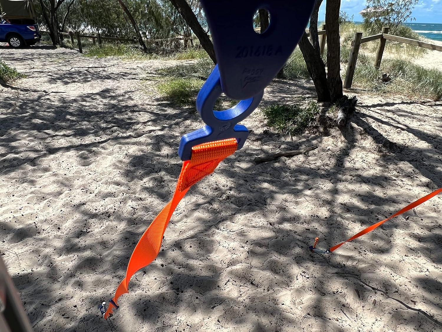 Peggy Peg - Orange Awning Storm Straps - Single Item - Tie down Strap 2.0 - Universal Fit for RV Awnings, Canopies & Gazebos image number 1