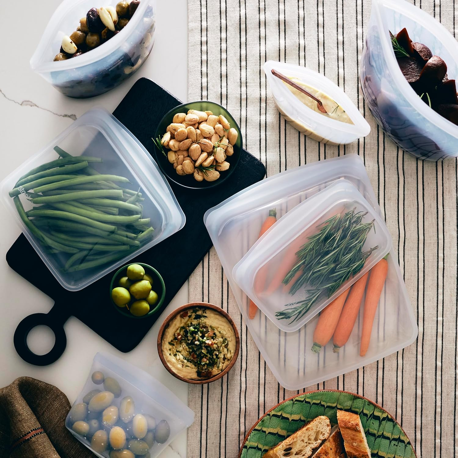 Stasher Premium Silicone Reusable Food Storage Bags, 6-Pack, Starter Kit, Clear | Multi-Use Food Storage Bags, Lunch Bag, Travel Containers | BPA Free, Leak-Free, Dishwasher-Safe, Eco-Friendly image number 1