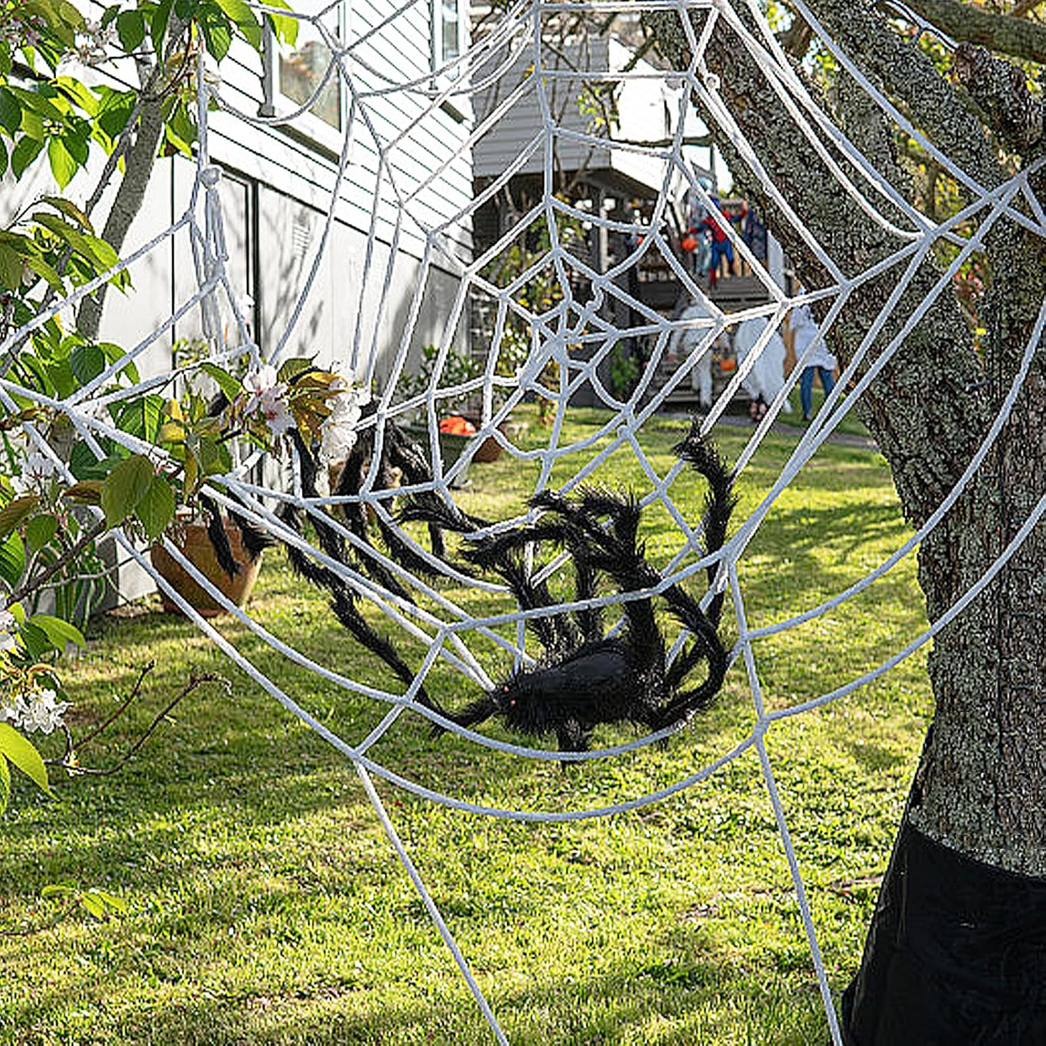 Giant Halloween Spider Web Decoration &ndash; Large round Stretchy Cobweb Rope Prop for Haunted House, Porch, Window, Indoor and Outdoor Party Decor