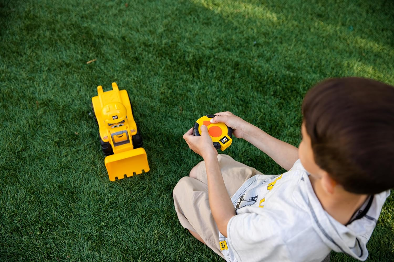 CAT Construction Toys, RC Remote Control Loader Truck - 10.5 Inch Length, Child Friendly Controller, Stowable Controller, Working Headlights - Batteries Included! image number 1