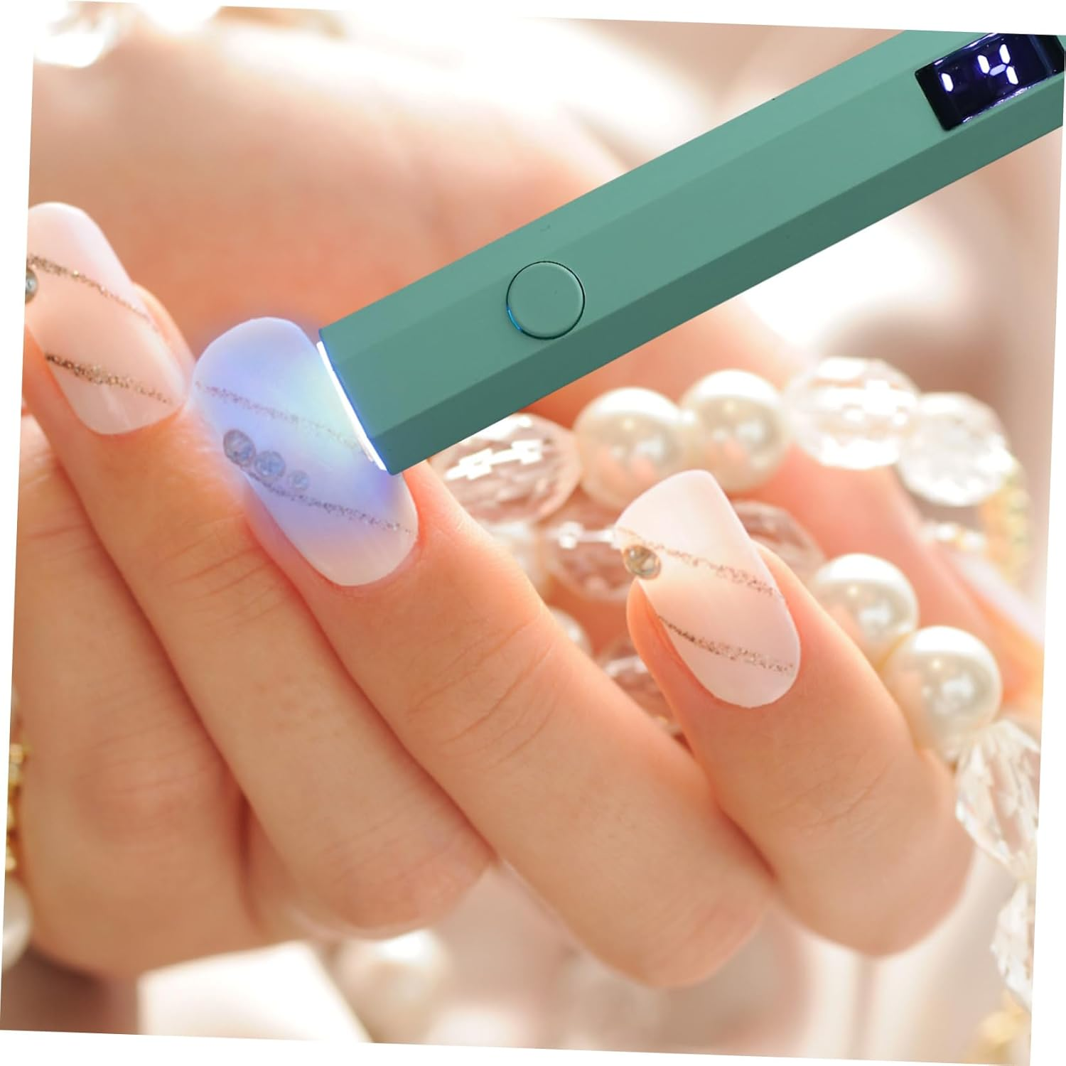 Mikinona Portable Rechargeable Mini Nail Lamp Cordless Handheld Gel Nail Dryer Quick Drying and Salon Use with Compact Travel Friendly Design image number 1