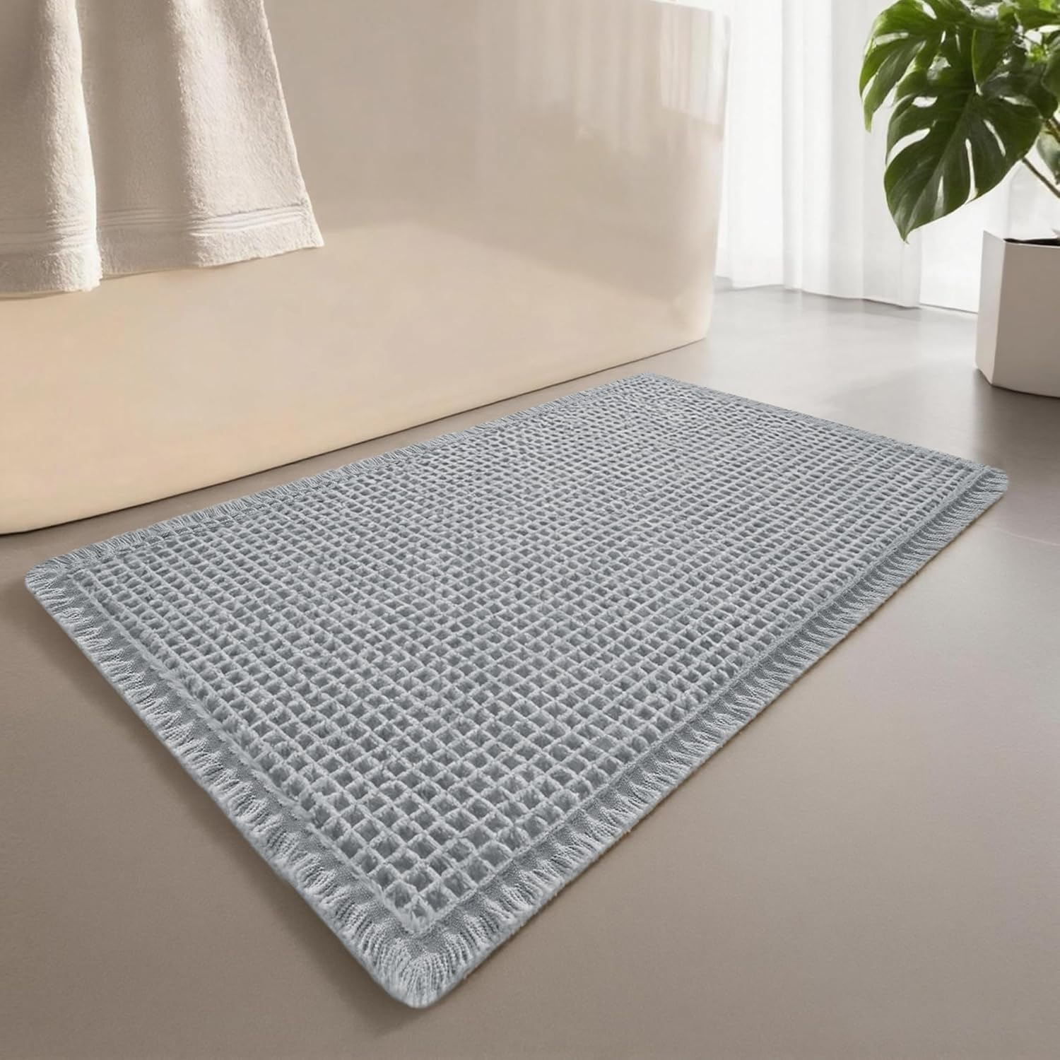 Cosinst Waffle Bath Mat 46X77Cm Super Absorbent Non Slip Comfortable Carpet for Tub, Shower Room, Machine Wash Quick Dry Bath Rugs with Tassels, Rubber Backed Bathroom Mats, Ultra Soft, Brown