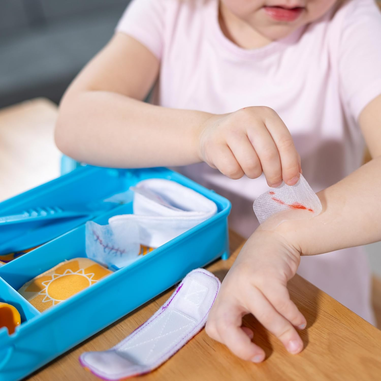 Melissa & Doug Pain & Bandages Reusable First Aid Playset &ndash; Role-Play Medical Kit with Water‑Reveal &ldquo;Pains&rdquo; & Bandages &ndash; Ages 3+