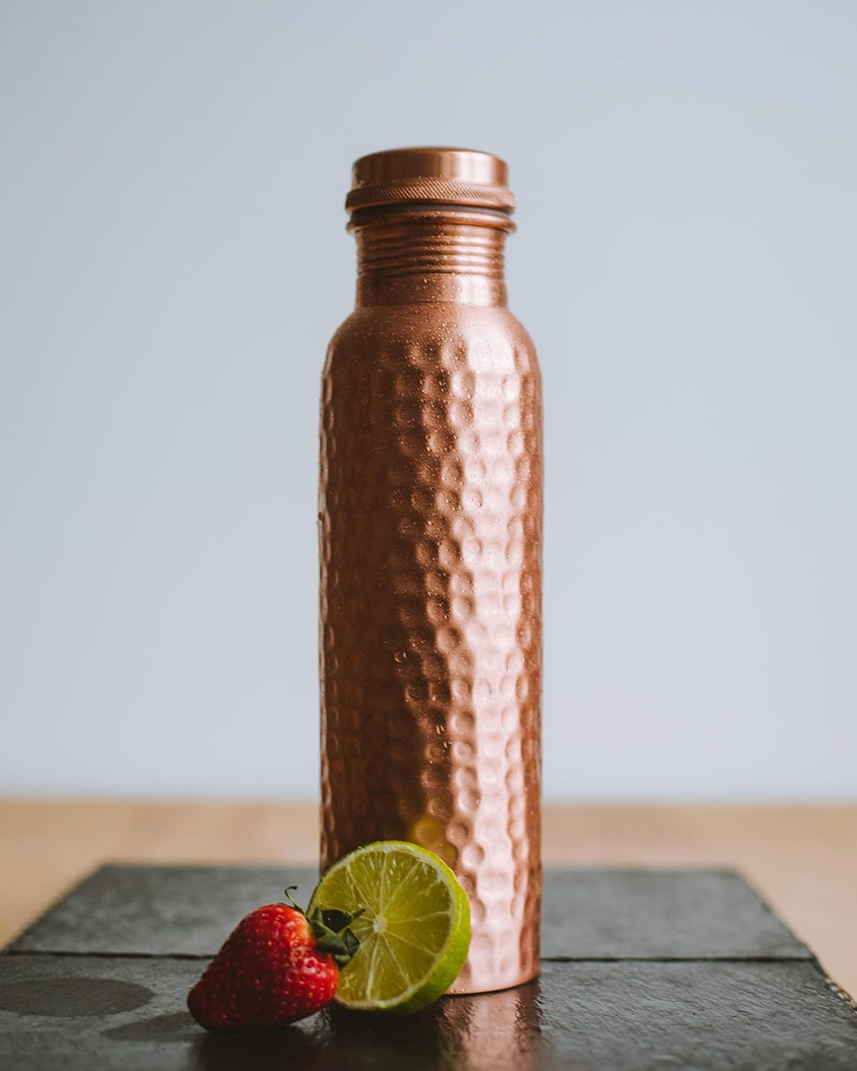 Copper Water Bottle - 34 Oz Extra Large - a Hammered Ayurvedic Pure Copper Vessel for Drinking - Drink More Water, Lower Your Sugar Intake and Enjoy the Health Benefits Immediately image number 1