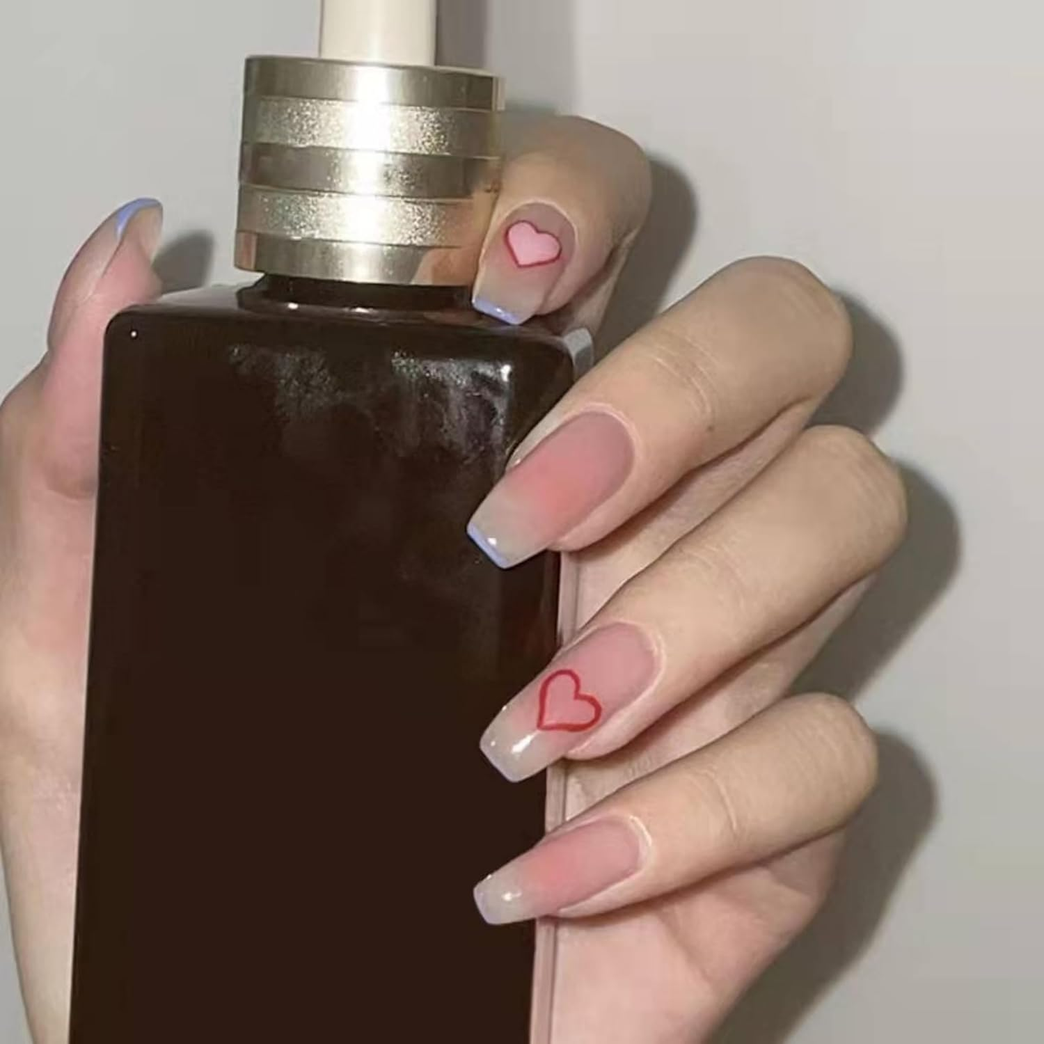 KAVI' S 24Pcs French Tip Stick on Nails Coffin Medium Long Press on Nails Nude Gradient Glitter Fake Nails Ballerina Acrylic False Nails Jerry Glue for Women Girls Nail Art (Peach Heart) image number 3