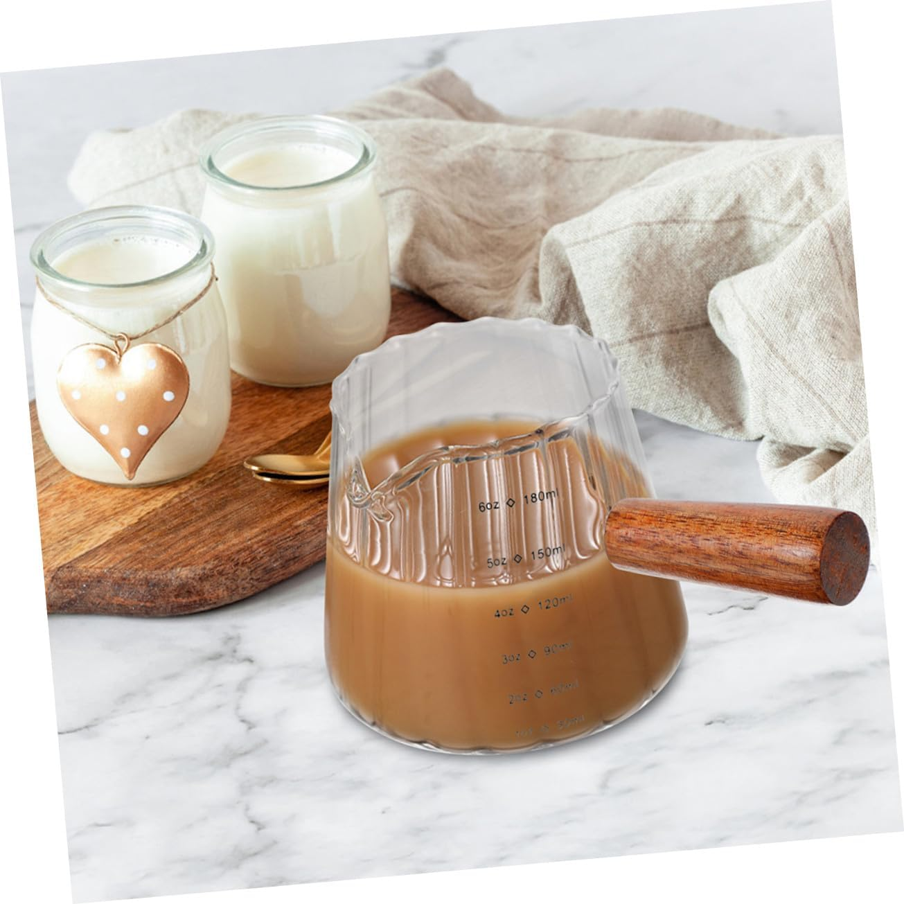 TOYZFRIENDY Glass Milk Pitcher and Frothing Cup with Wooden Handle, Heat-Resistant Multi-Function Measuring Syrup and Coffee Glass Set (2Pcs) for Home and Espresso Brewing image number 4