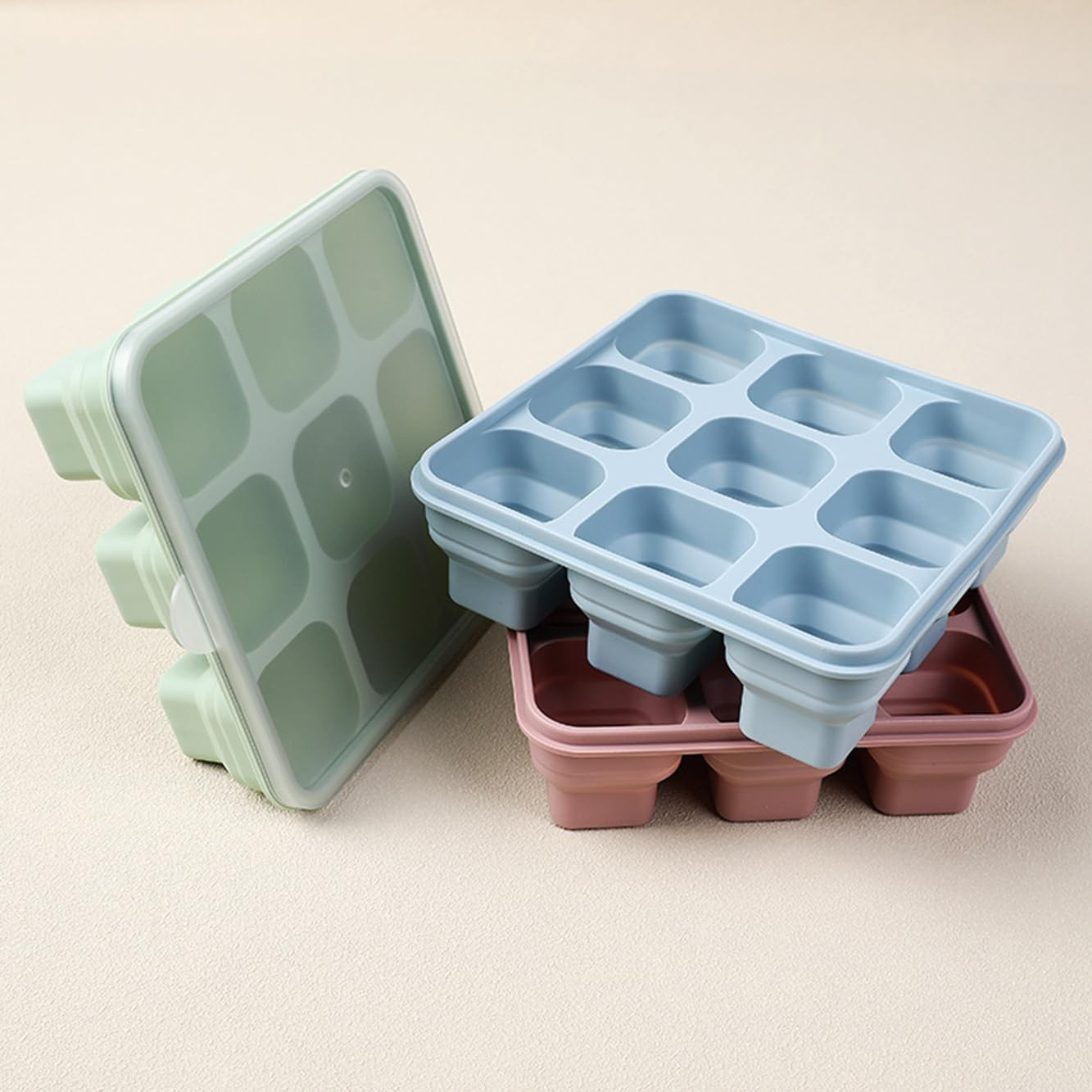 Foldable Silicone Ice Cube Trays with Lids - 3 Pack, Bpa-Free Stackable Ice Trays for Freezer, 27 Large Cubes for Cocktails, Baby Food & Coffee (Pink/Green/Blue) image number 6