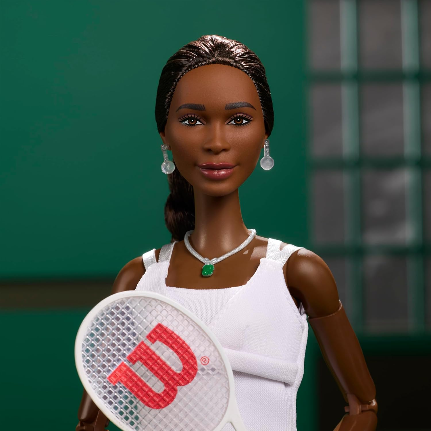 Barbie Inspiring Women Series, Venus Williams Fashion Doll with Signature Tennis Uniform and Racket, Includes Displayable Packaging image number 1
