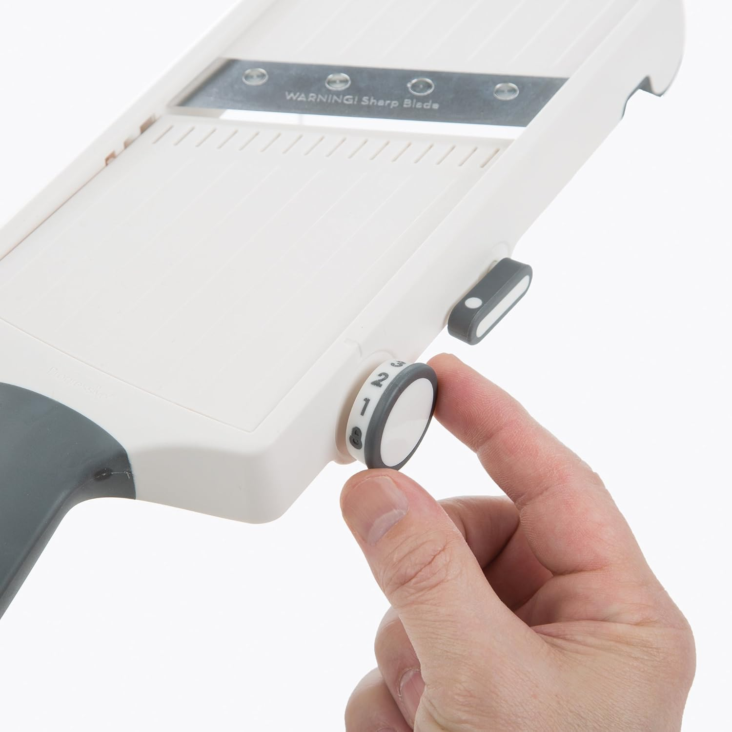 Progressive Hand-Held Adjustable Julienne and Slicer - Angled Stainless Steel Blade, Four Thickness Levels, Sturdy Hand Guard W/Strong Stainless Steel Prongs, Non-Skid Edge - White/Grey image number 1