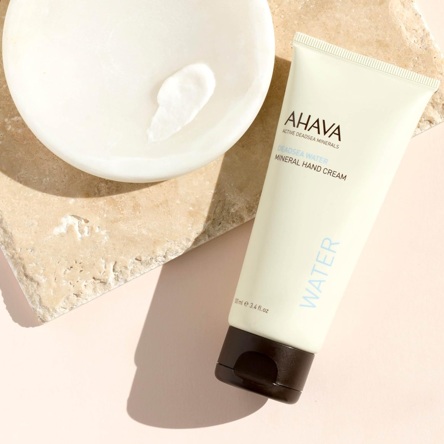 AHAVA Dead Sea Water Mineral Hand Cream - Hand Moisturizer for Dry Cracked Hands, Light & Fast Absorbing, Enriched with Exclusive Blend Osmoter, Smoothing Witch Hazel & Soothing Allantoin, 3.4 Fl.Oz image number 1