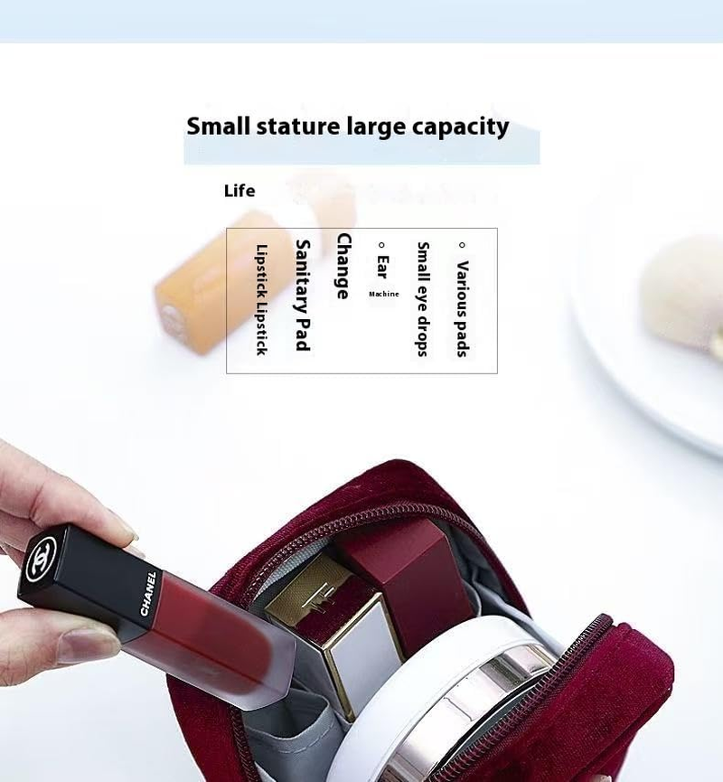 A Portable Beauty Companion This Burgundy Suede Hanging Bag Effortlessly Holds Items Such as Lipsticks and Earrings. image number 4