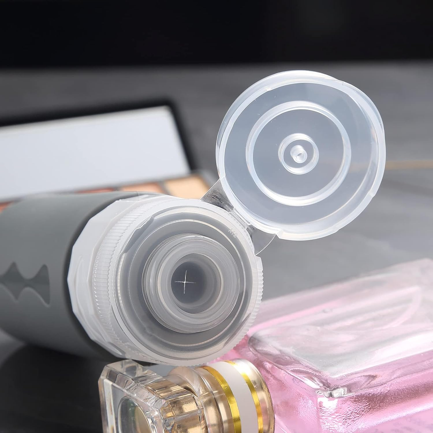 MUYXGYFE Pack of 4 Silicone Travel Bottles 90 Ml,Tsa Approved Bottles Set,Leak-Proof Container and Travel Toiletries Set,Filling Shampoo Cream Conditioner Body Care (Grey) - Grey image number 1