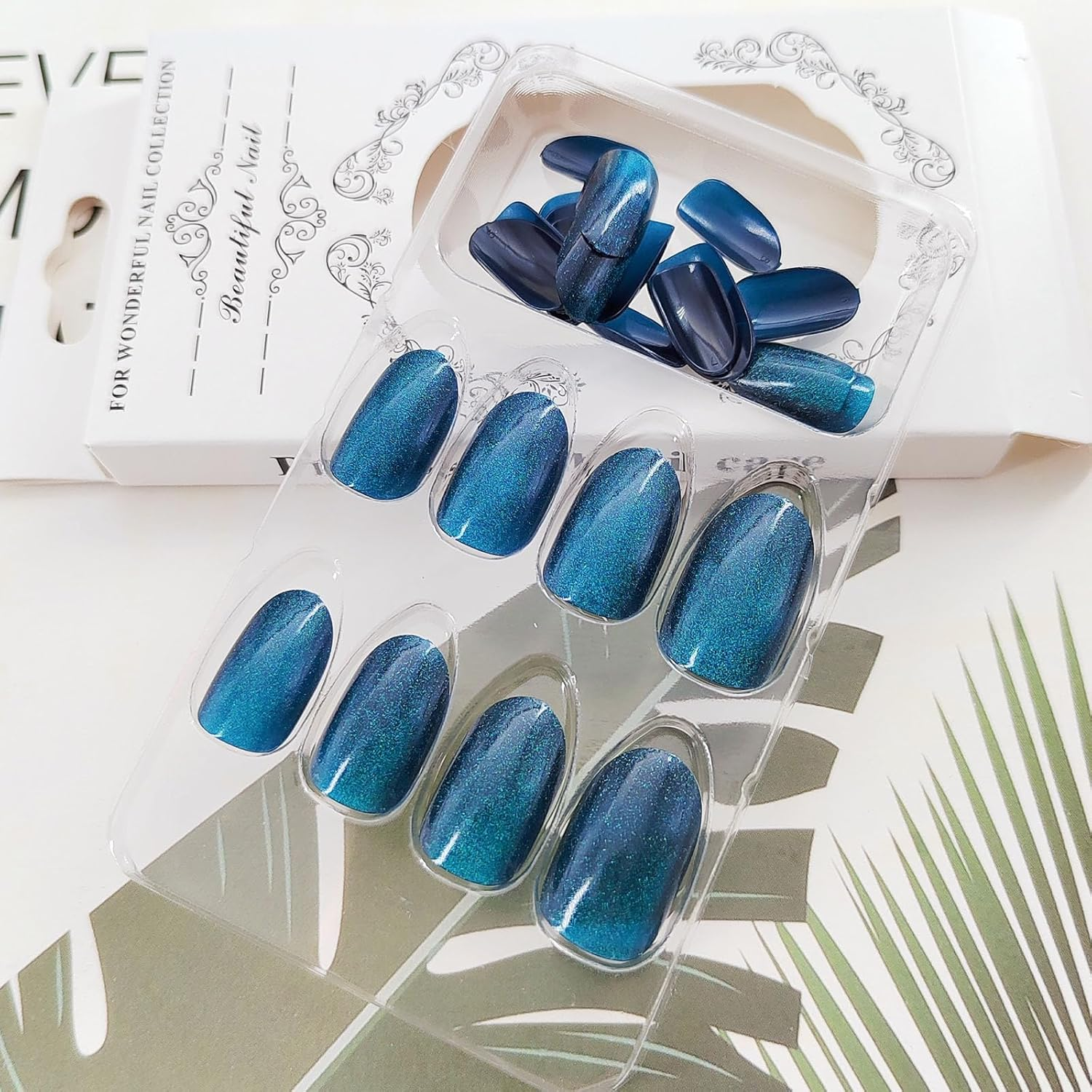 Xenophoer Short Press on Nails Oval Blue Cat Eye Fake Nails Acrylic Glue on Nails with Silver Glitter Designs Nails Press Ons for Women Daily Wear 24 Pcs