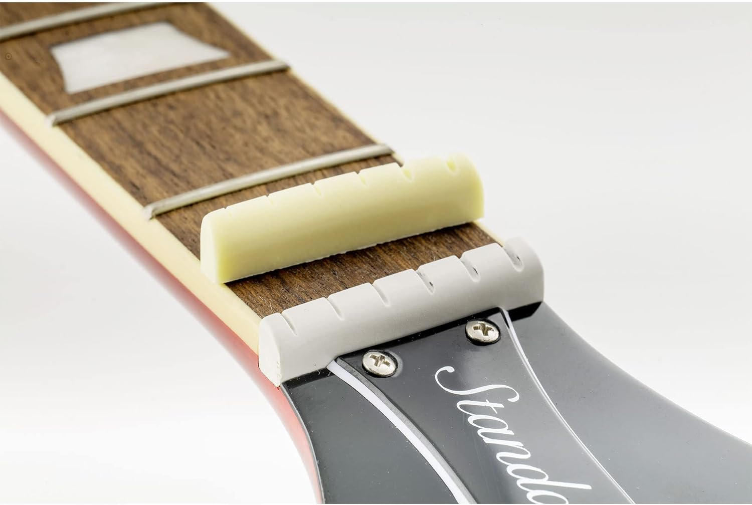 Musiclily Pro Urea Resin Plastic Slotted 43Mm LP Style Guitar Nuts Flat Bottom for 6 String Les Paul or Acoustic Guitar, Ivory(Set of 2) image number 3