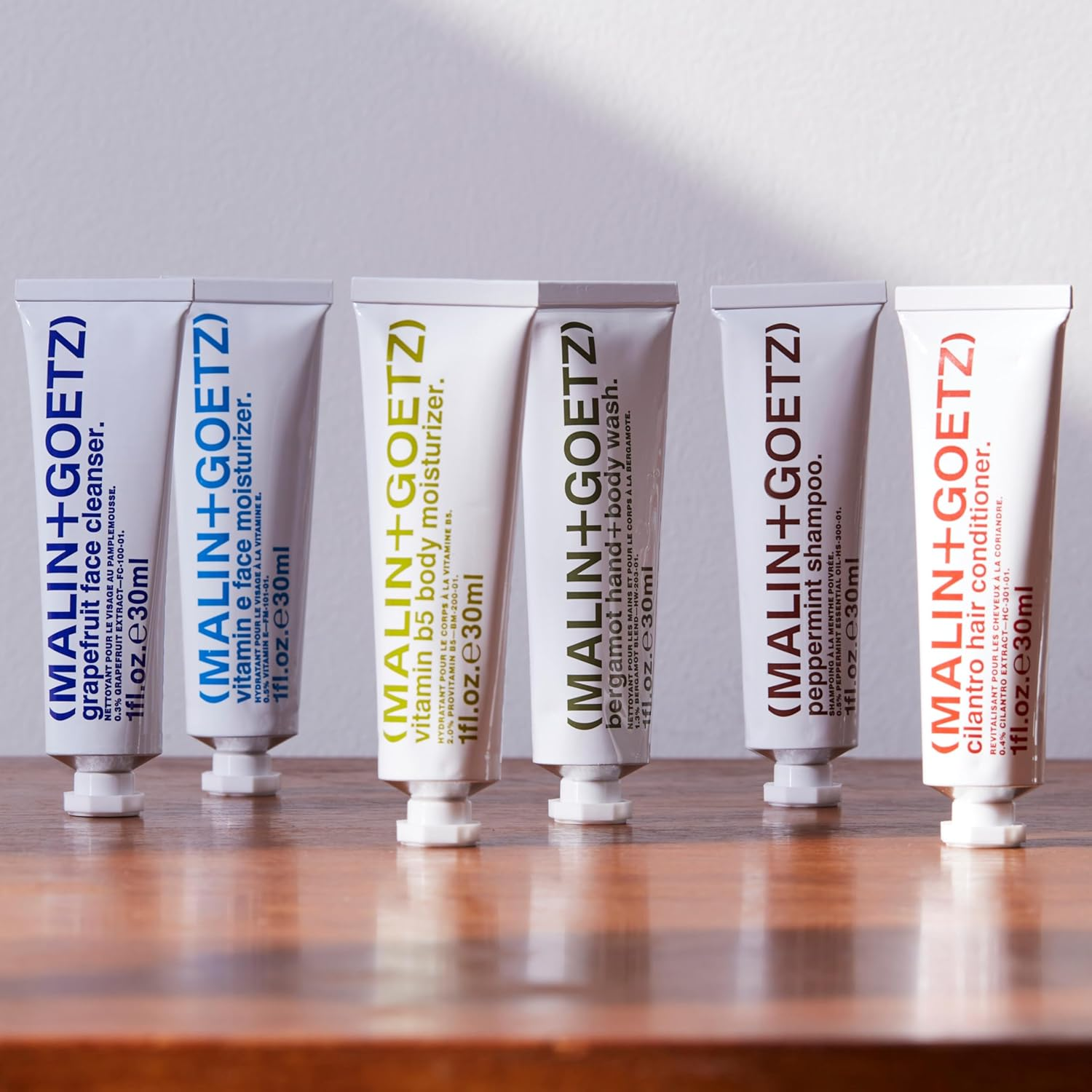 Malin + Goetz Essential Starter Kit- Including Hair Shampoo & Conditioner, Facial Cleanser & Moisturizer, Body Wash & Moisturizer, All Natural Ingredients, All Skin Types, Cruelty-Free, Vegan image number 2