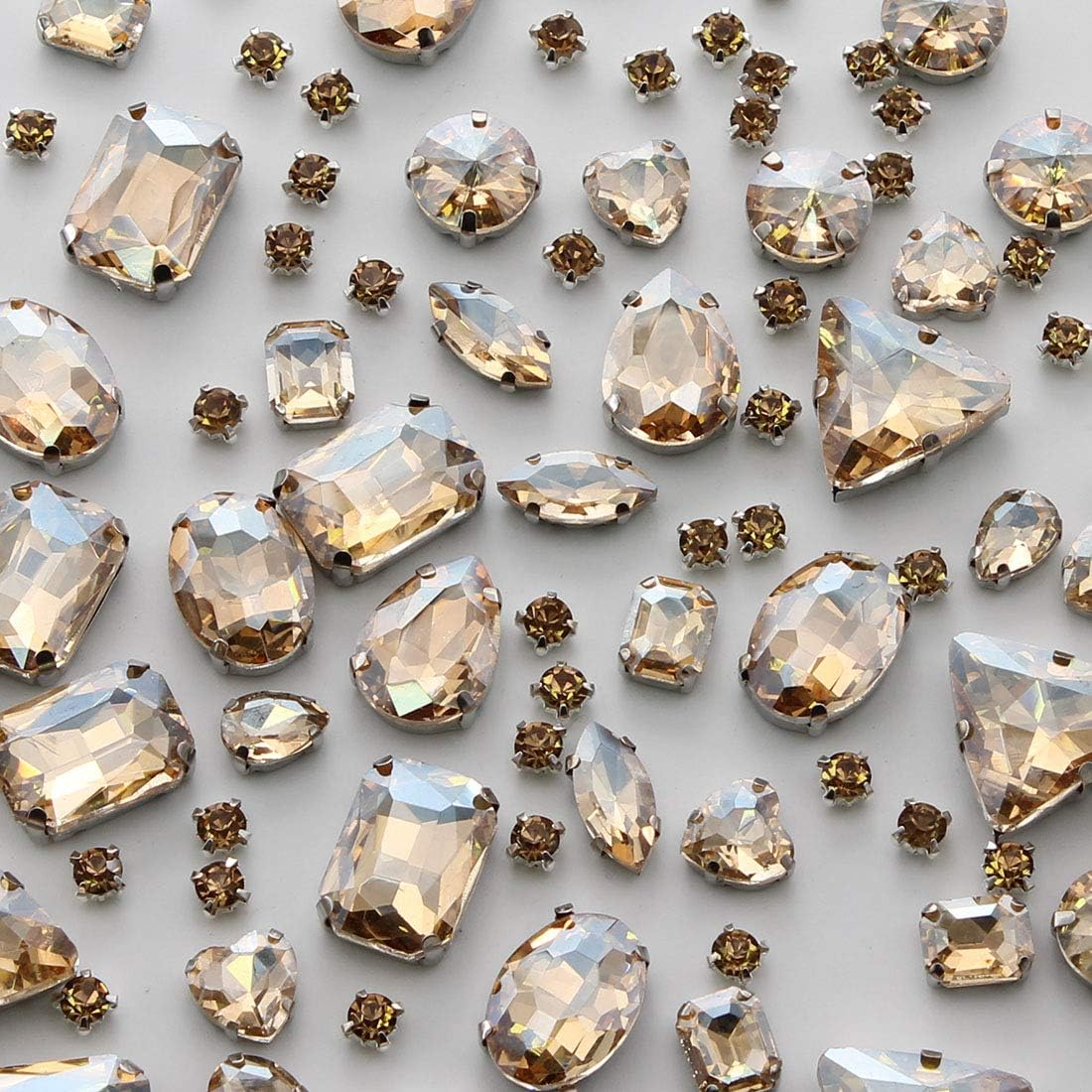 TANOSII Sew on Rhinestones 100 PCS Mixed Shapes Glass Rhinestones Sew on Crystal Gems Mental Flatback with Silver Claw for Jewelry Crafts Clothes Shoes Costume Garment White Type 1