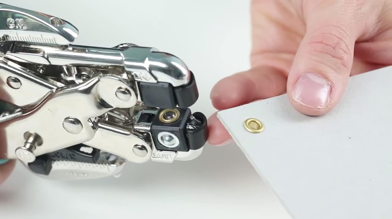 We R Memory Keepers 70908-4 Crop-A-Dile Eyelet and Snap Punch Kit | Includes Crop-A-Dile with Pink Comfort Handle, Heavy-Duty-Plastic Carrying Case, 100 Eyelets in Assorted Colors and Instructions