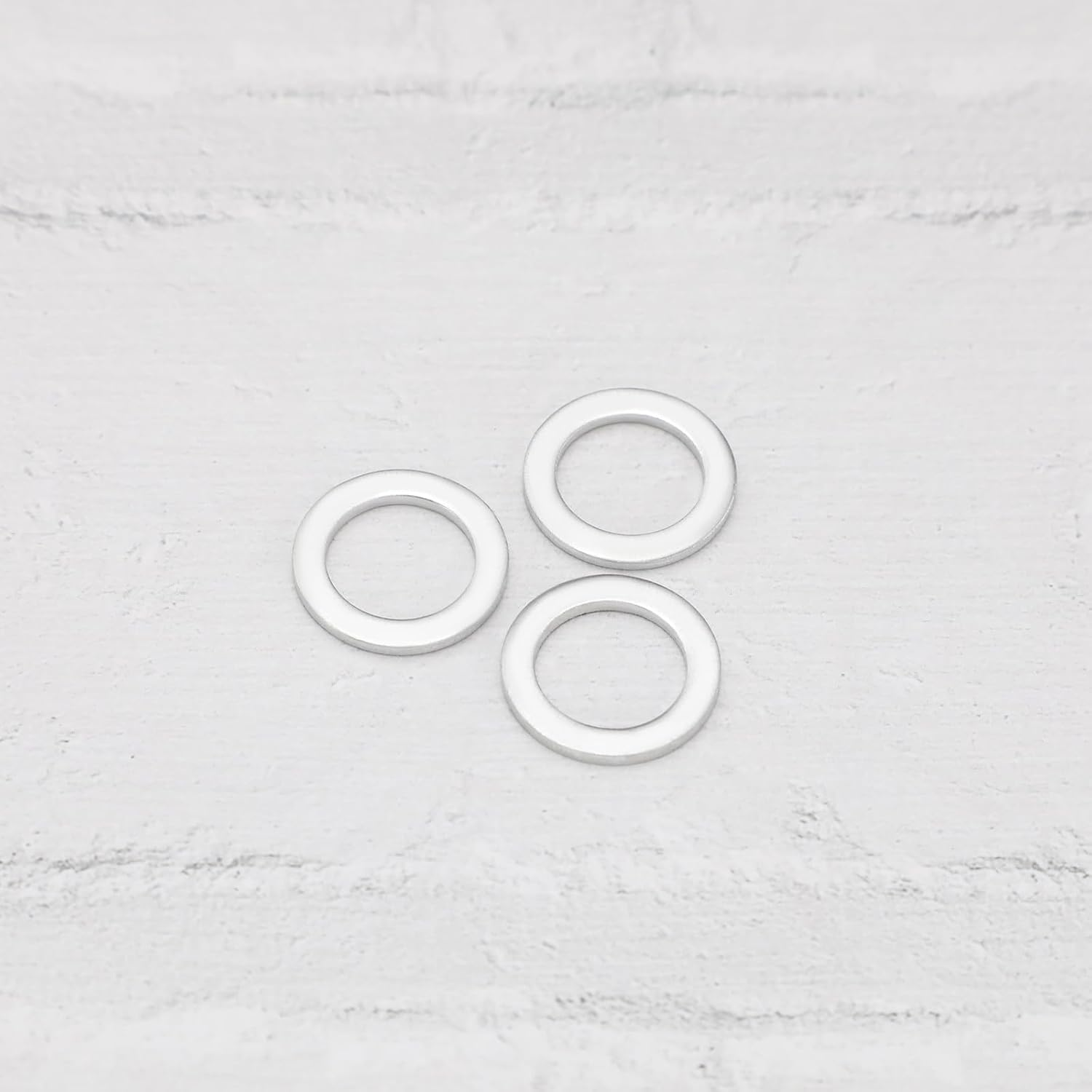 SG Store 10Pcs Sump Plug Aluminium Washer Oil Drain Plug Gasket 18Mm X 12Mm X 1.5Mm 420.2.001.7A 42020017A Compatible with Aprilia AF1 125 1988-1993 image number 1