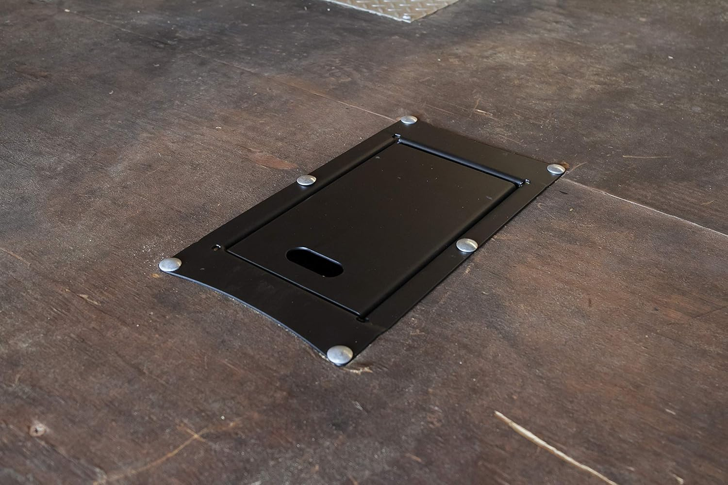 Camco Recessed Motorcycle Wheel Chock - Accommodates Most Tire Sizes - Constructed of Powder-Coated Steel (66101) image number 1