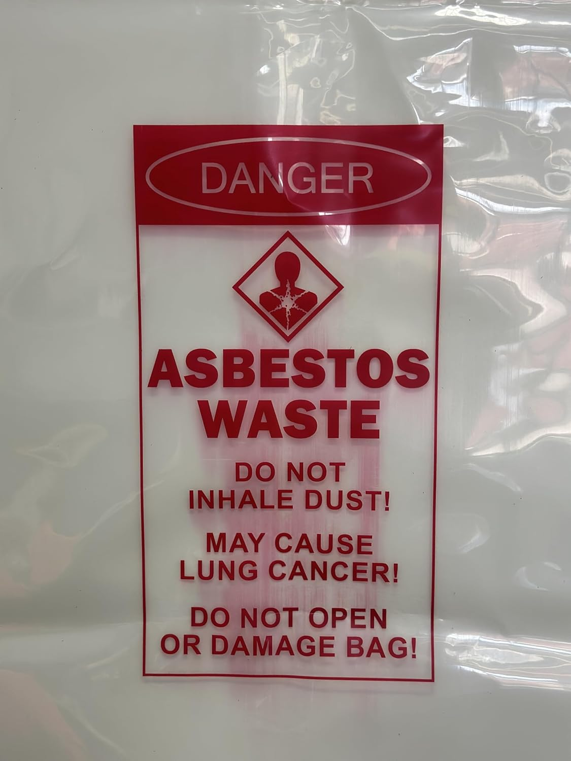 Pacific Bags Australia Medium Clear Asbestos Waste Bags &ndash; 700 Mm X 1100 Mm, 200 &Mu;m Virgin Low Density Polyethylene, Warning Labelled, 50 Bags per Carton (1 Roll)