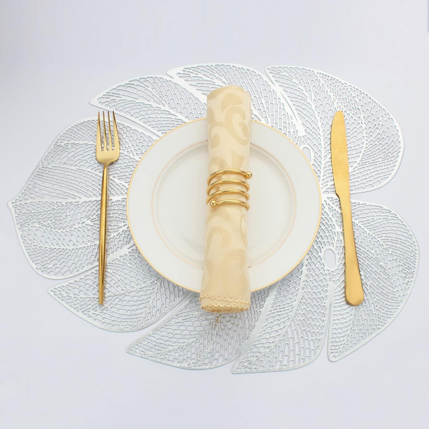 Evevda Silver Leaf Shaped Vinyl Placemats Set of 4 Metallic Plastic Place Mats Wipeable 4Pcs Table Mats for Wedding Anniversary Dinner Table Decoration Mats(17.7X13.8Inch/45X35Cm)