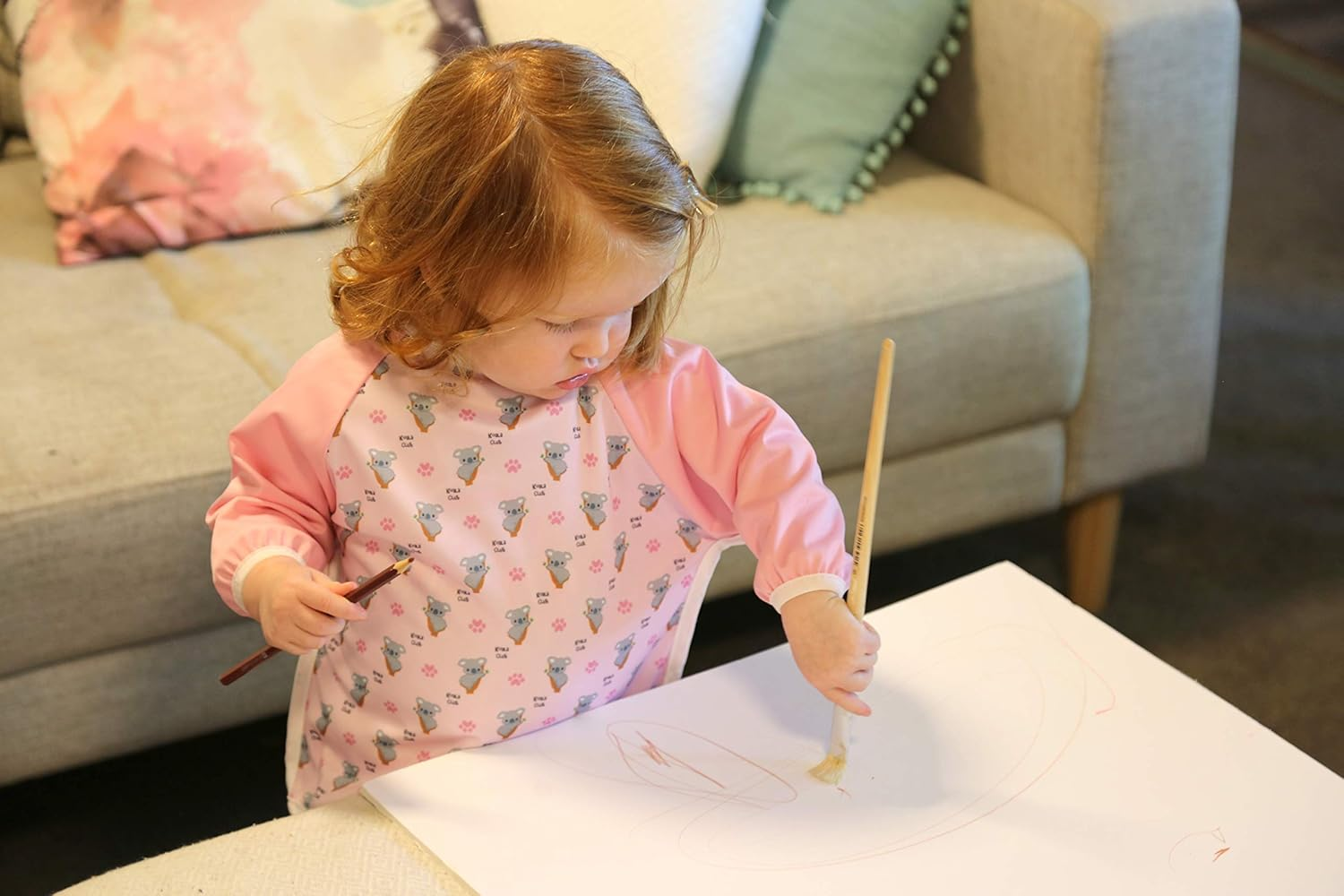 Australian Designed Sleeved Baby Bib with Pocket 6-24 Months. Waterproof: Full Coverage for Highchair Feeding, Arts and Crafts and Messy Painting! Cute Koala Print Art Apron Smock for Baby and Toddler and Includes Smock Pocket. 1 Piece (Pink) - Pink image number 3