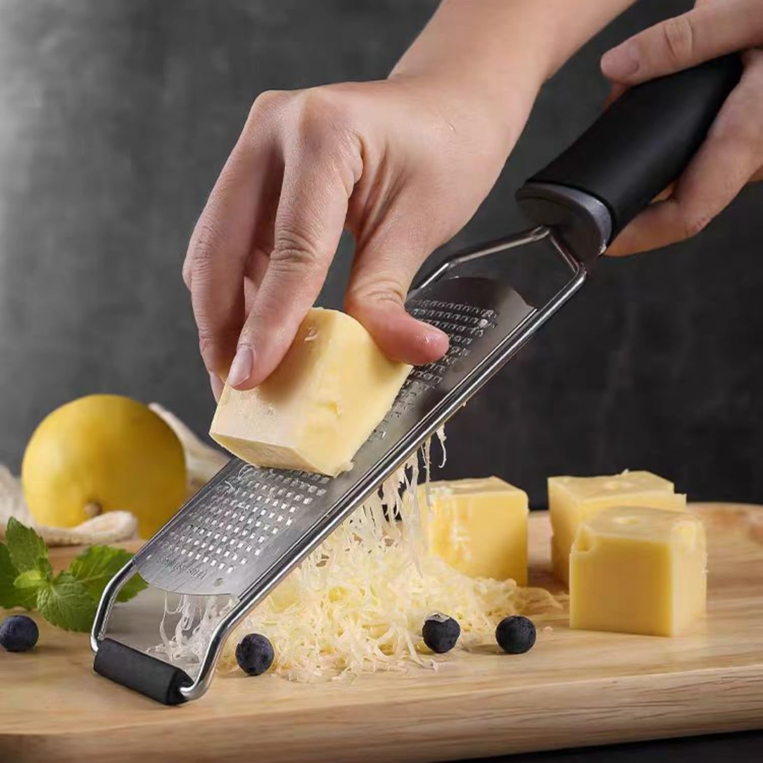 Stainless Steel Lemon & Cheese Grater - Professional Grater for Fruits, Vegetables & Chocolate - Includes Protective Sleeve & Cleaning Brush - Black - Red image number 5