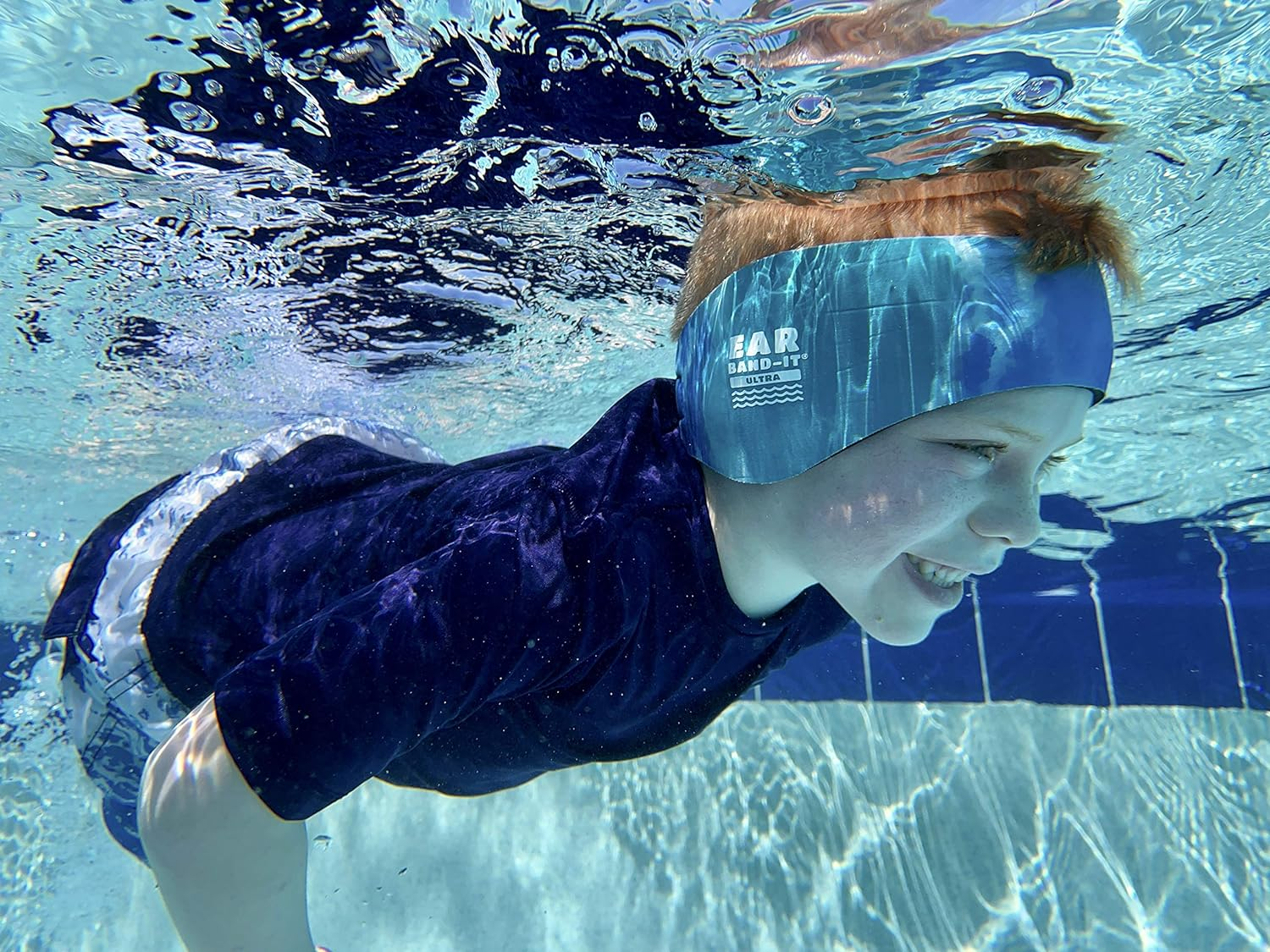 EAR BAND-IT Ultra Swimming Headband &ndash; Swim Ear Band to Block Water & Secure Earplugs &ndash; Kid & Adult Sizes &ndash; Water Protection for Bath, Shower, Pool, Beach, Lake (Medium Ages 4-9)