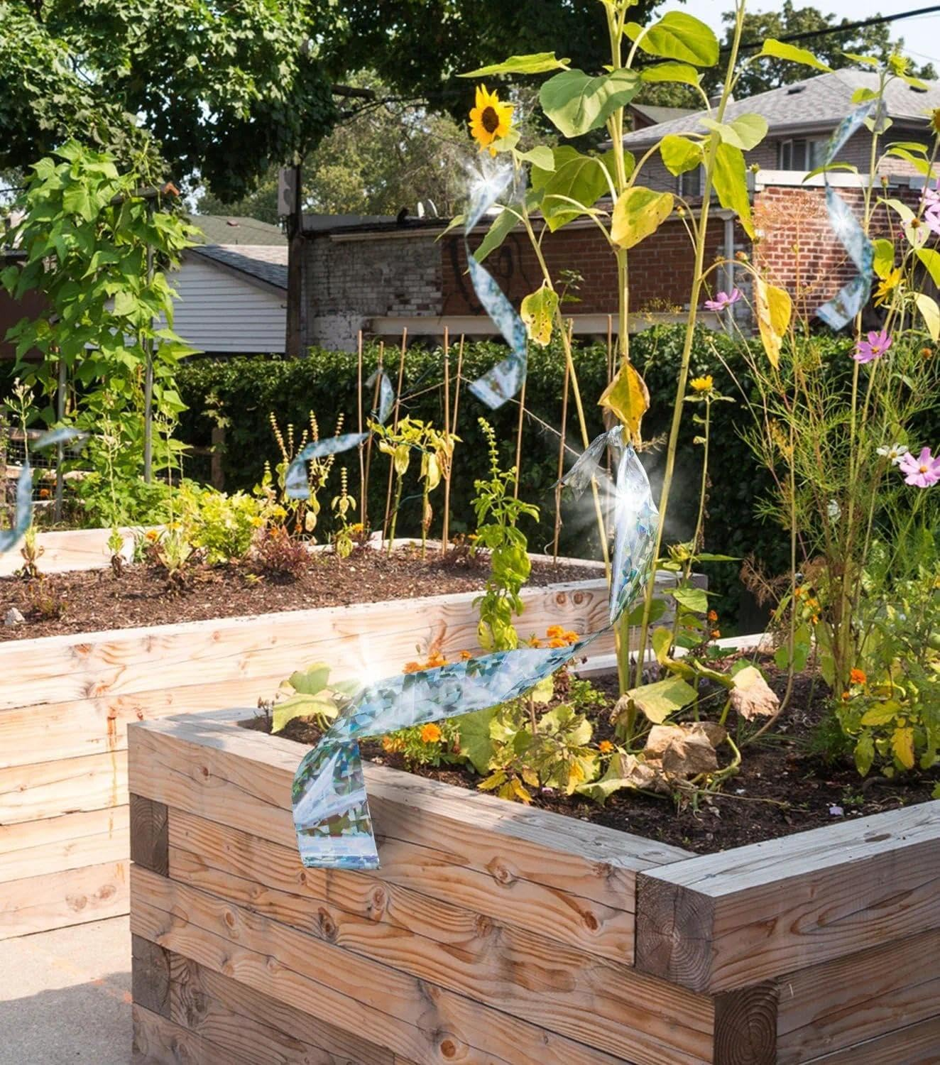 Bird Scarer Reflective Tape, Dual-Sided Bird Deterrent Ribbon for Outdoor Use, Premium Quality Scare Tape for Pigeons, Geese & More &ndash; 350 Ft Long by Fengea image number 4