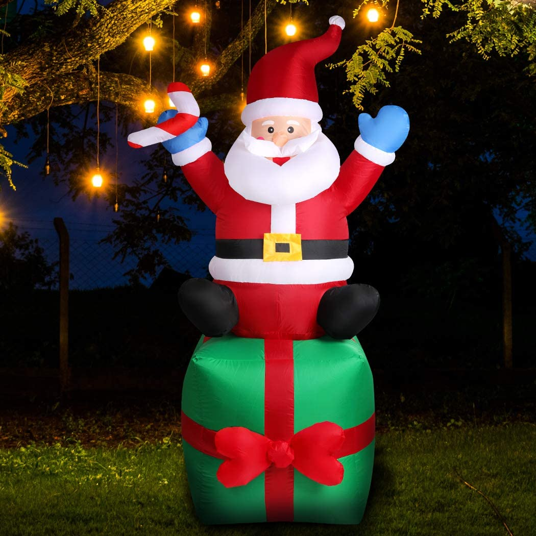 Santaco 1.8M Christmas Inflatable Santa on Gift Box with 12 LED Lights, Self-Inflating and Deflating with Built-In Fan, IP44 Waterproof Outdoor Decoration, Easy Setup,Festive Yard or Garden Decor image number 2
