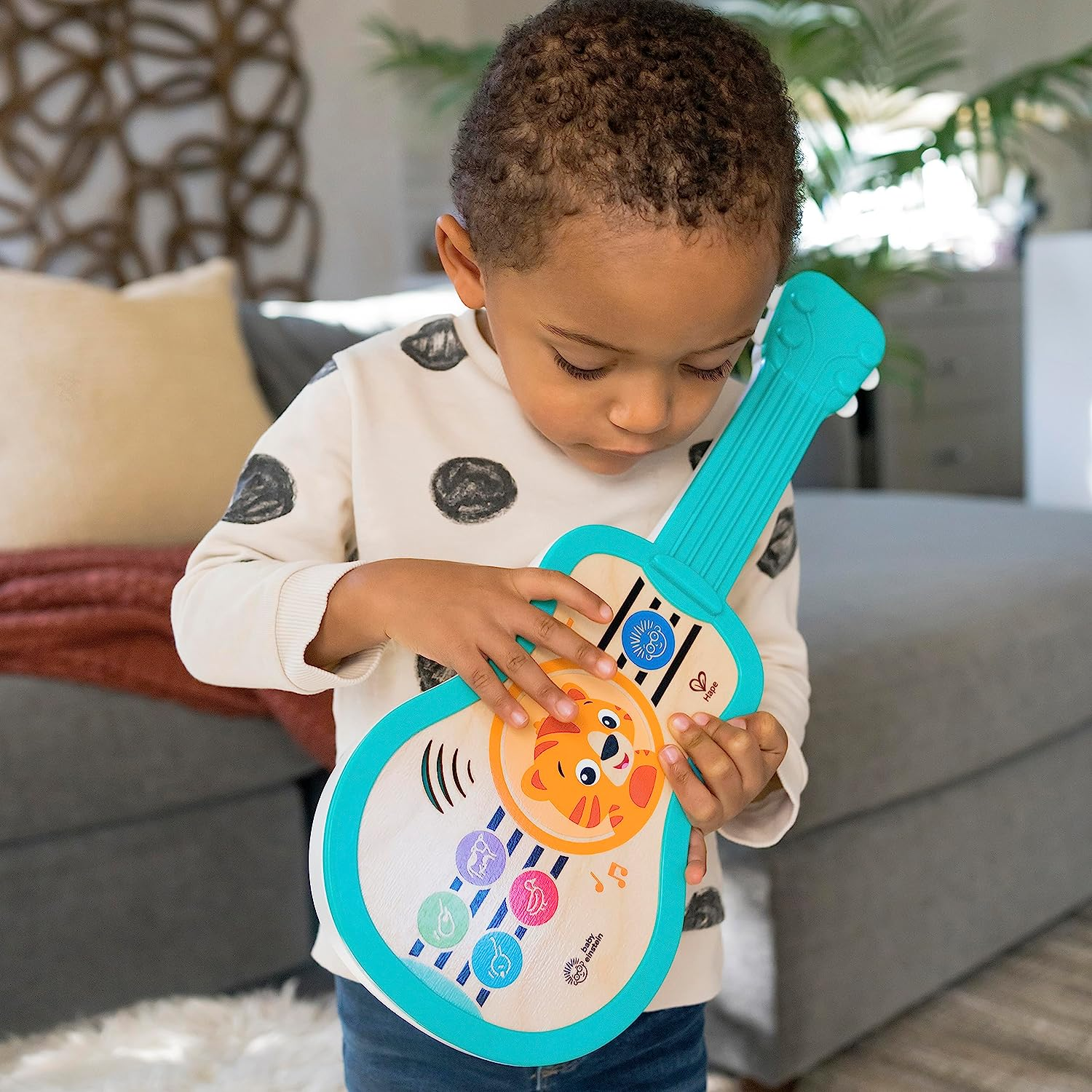 Baby Einstein Sing & Strum Magic Touch Ukulele Wooden Musical Toy, Ages 6 Months+, Multicolored image number 3