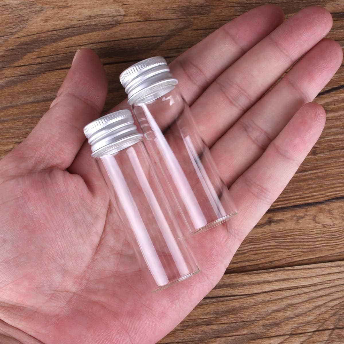 24 Pieces 18Ml Mini Glass Bottles with Aluminium Lids Small Glass Vials Wishing Jars Potion Bottles image number 1